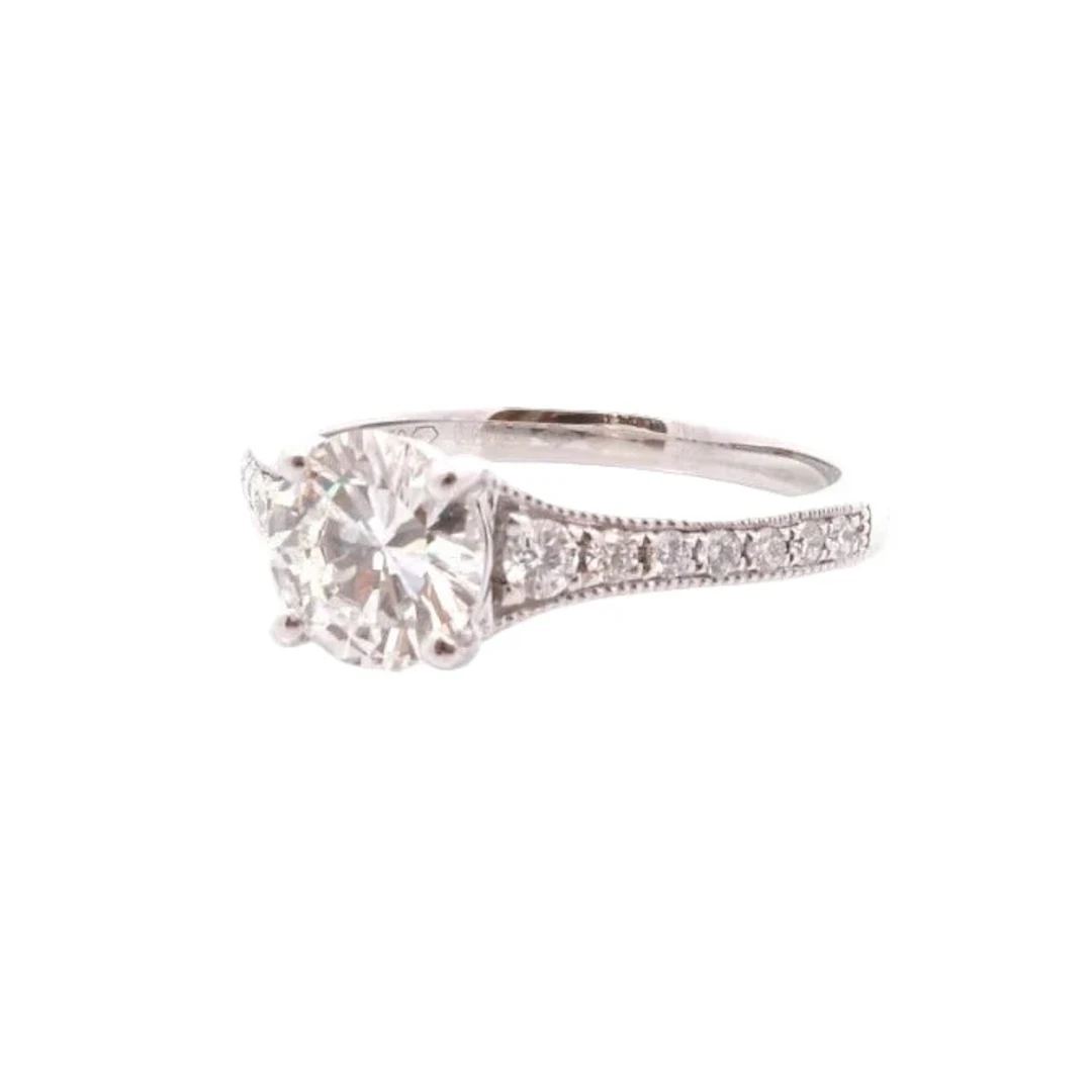 Platinum solitaire ring with platinum diamonds