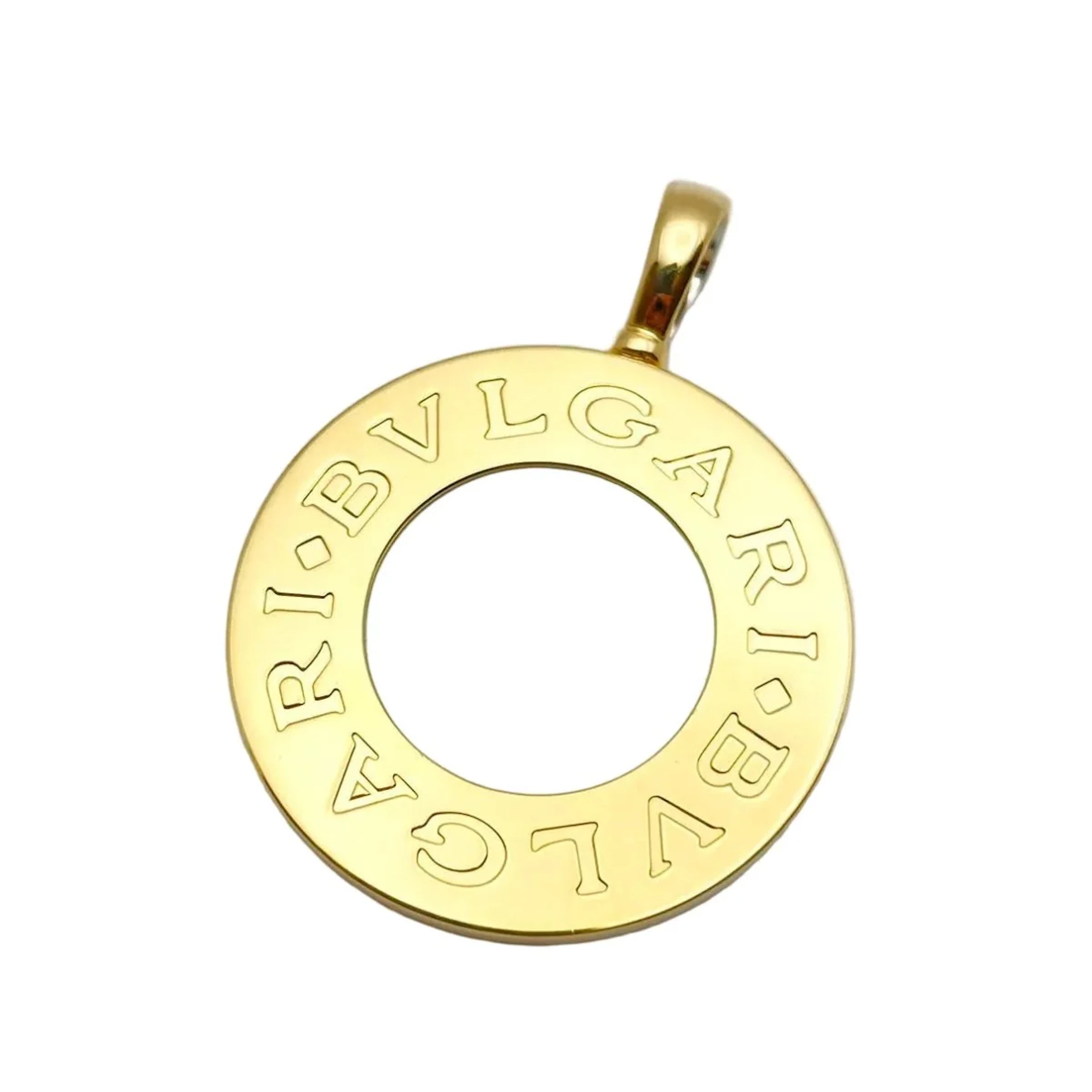 Pendentif BULGARI en or blanc, or jaune, nacre et onyx