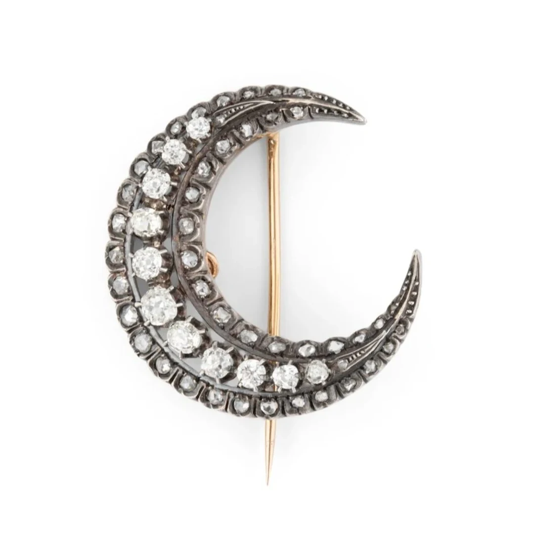 Moon Pin brooch in yellow gold, silver and diamonds