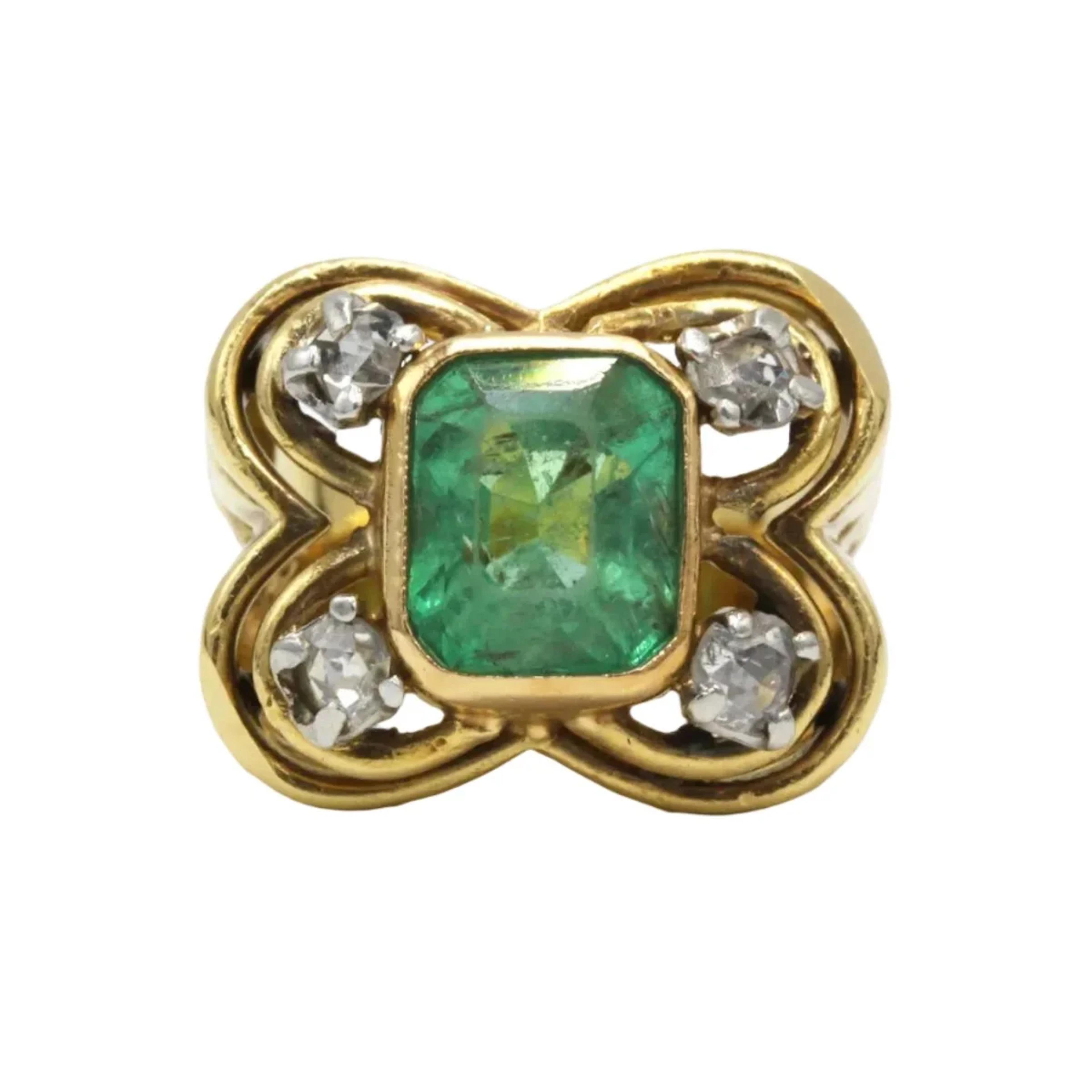 Ring in yellow gold, paltinium, emeralds and diamonds