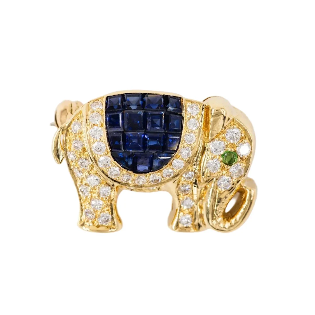 "Elephant" brooch in yellow gold, diamonds, and sapphires