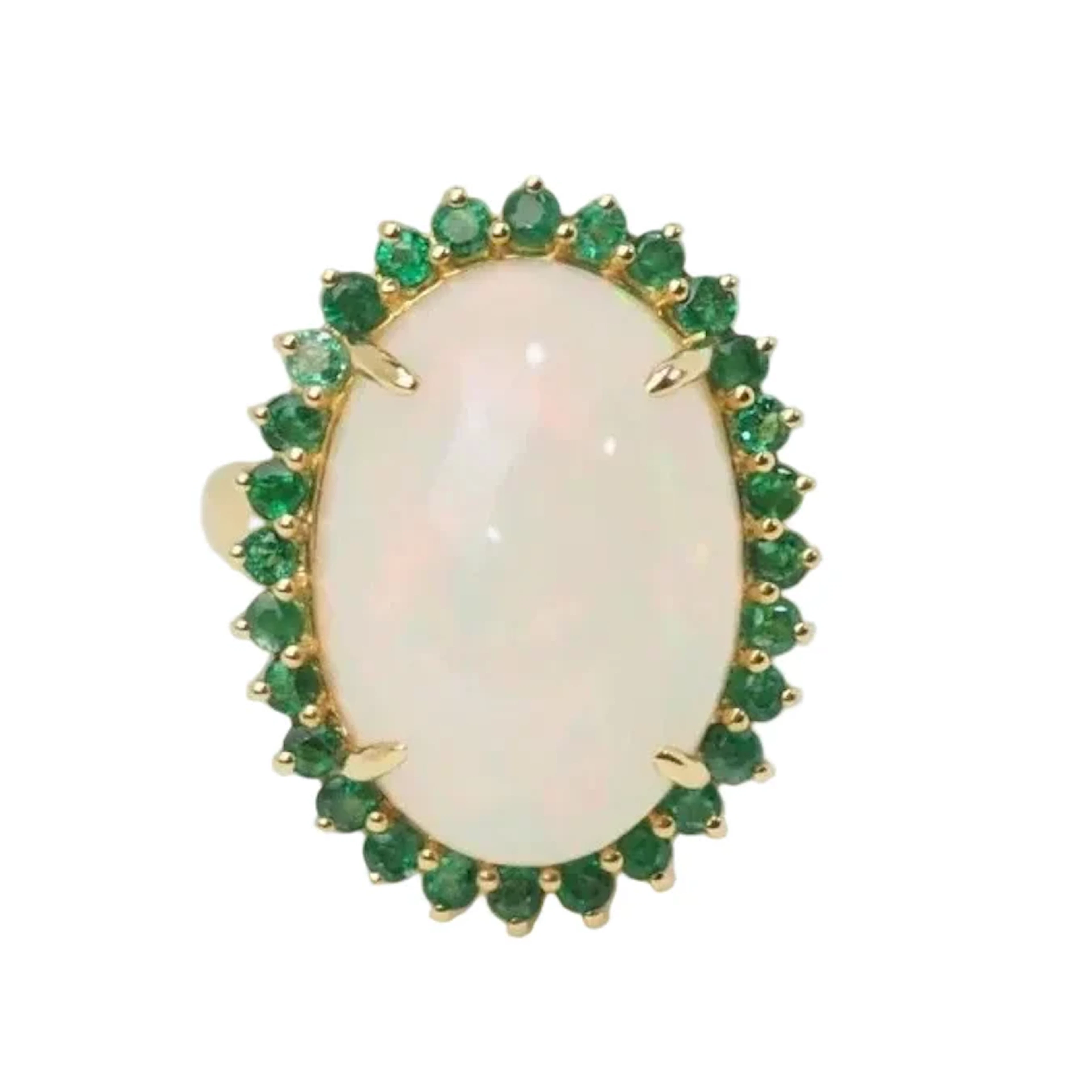 Oval ring in yellow gold, cabochon opal and emeralds