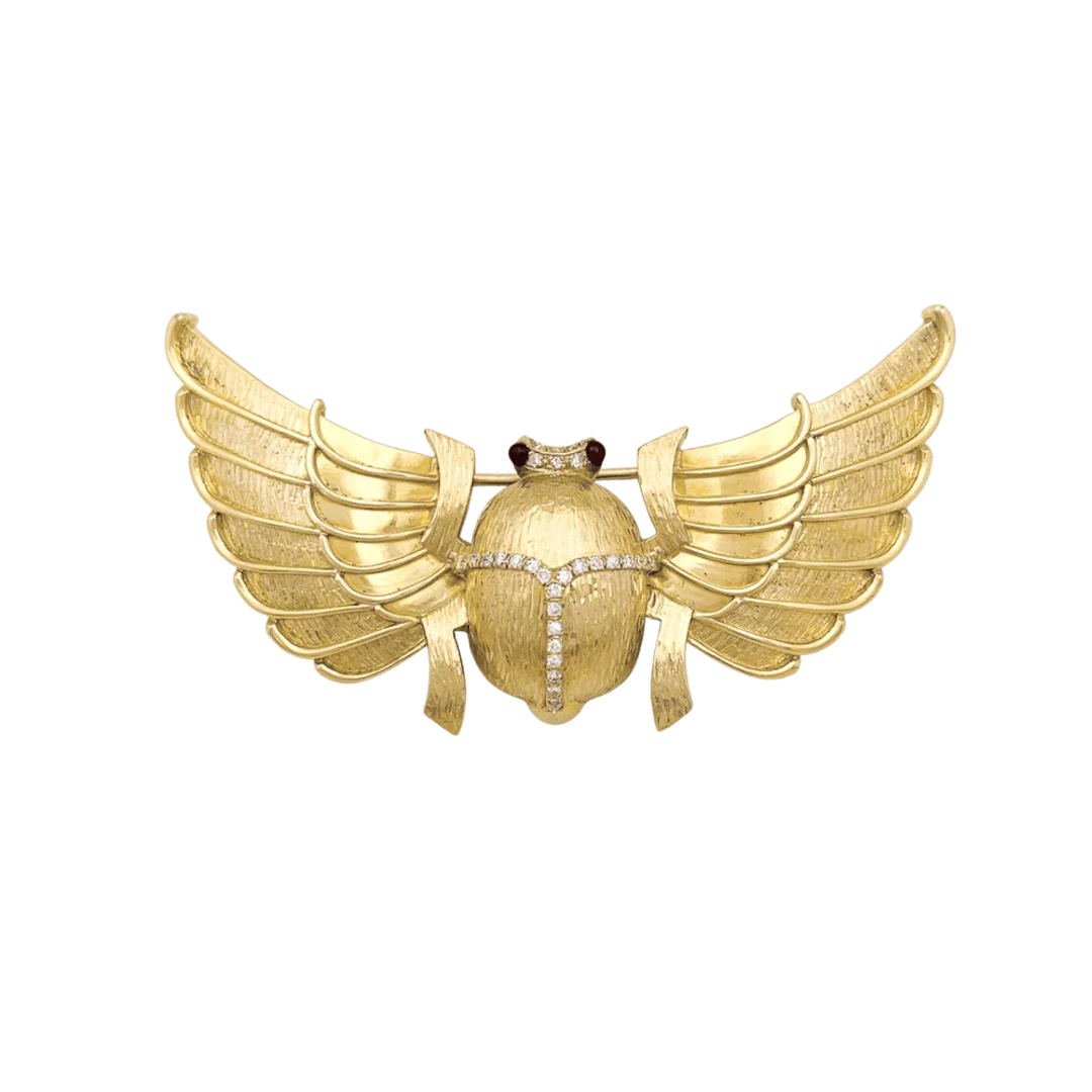Broche Épingle en or jaune, rubis et diamants