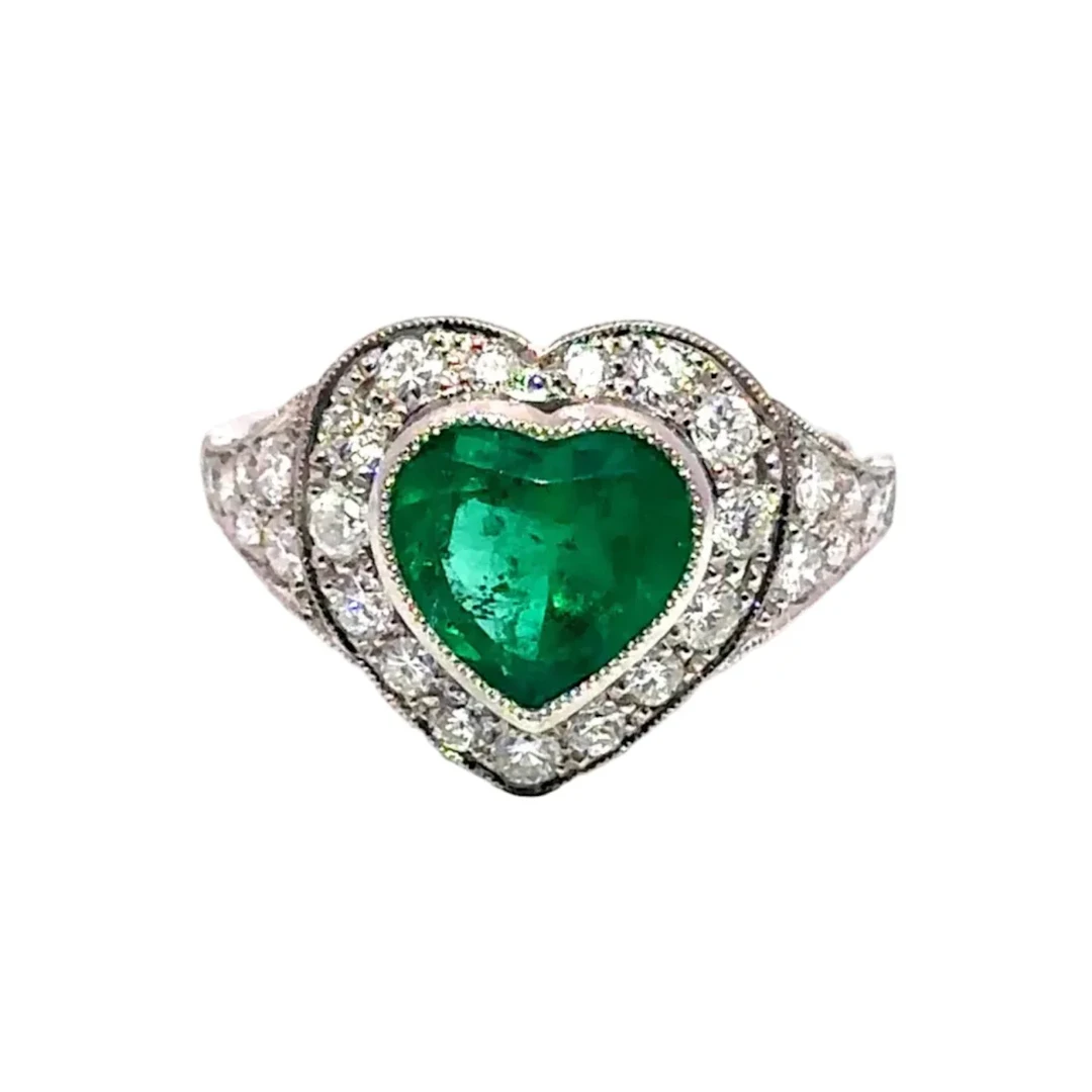 Entourage Ring in Platinum, Emerald, and Diamonds