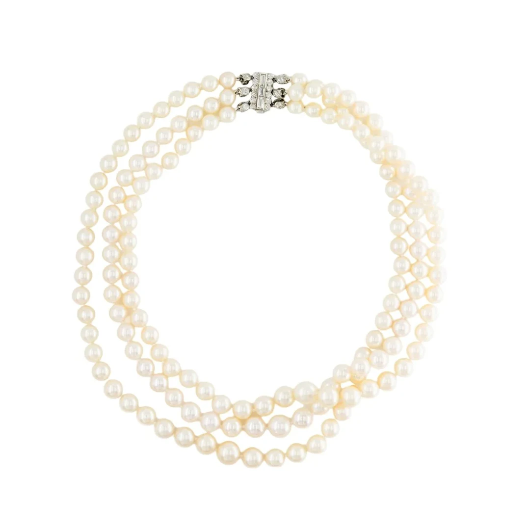 CARTIER Pearl Necklace in white gold, Platinum, and Diamonds