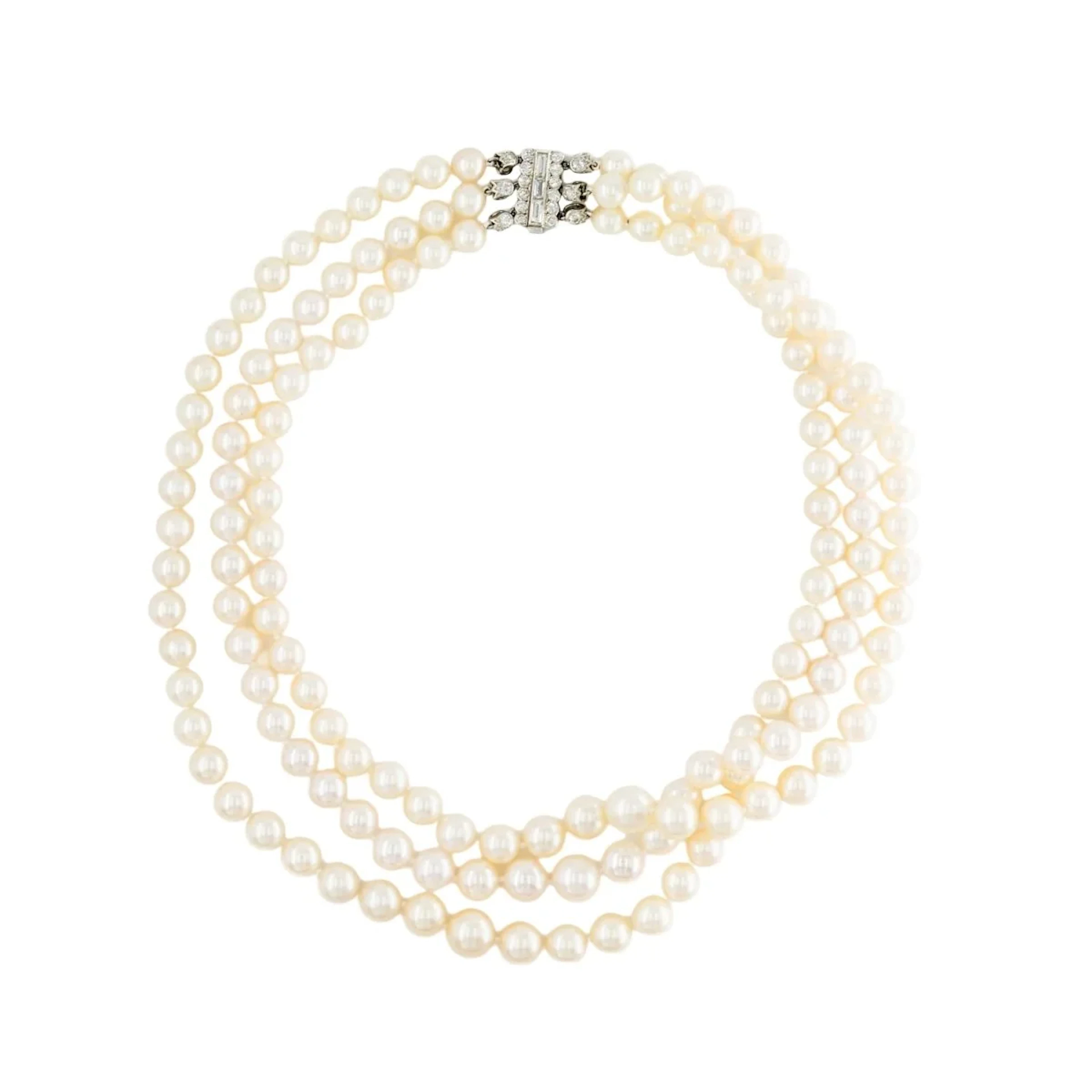 CARTIER Pearl Necklace in white gold, Platinum, and Diamonds