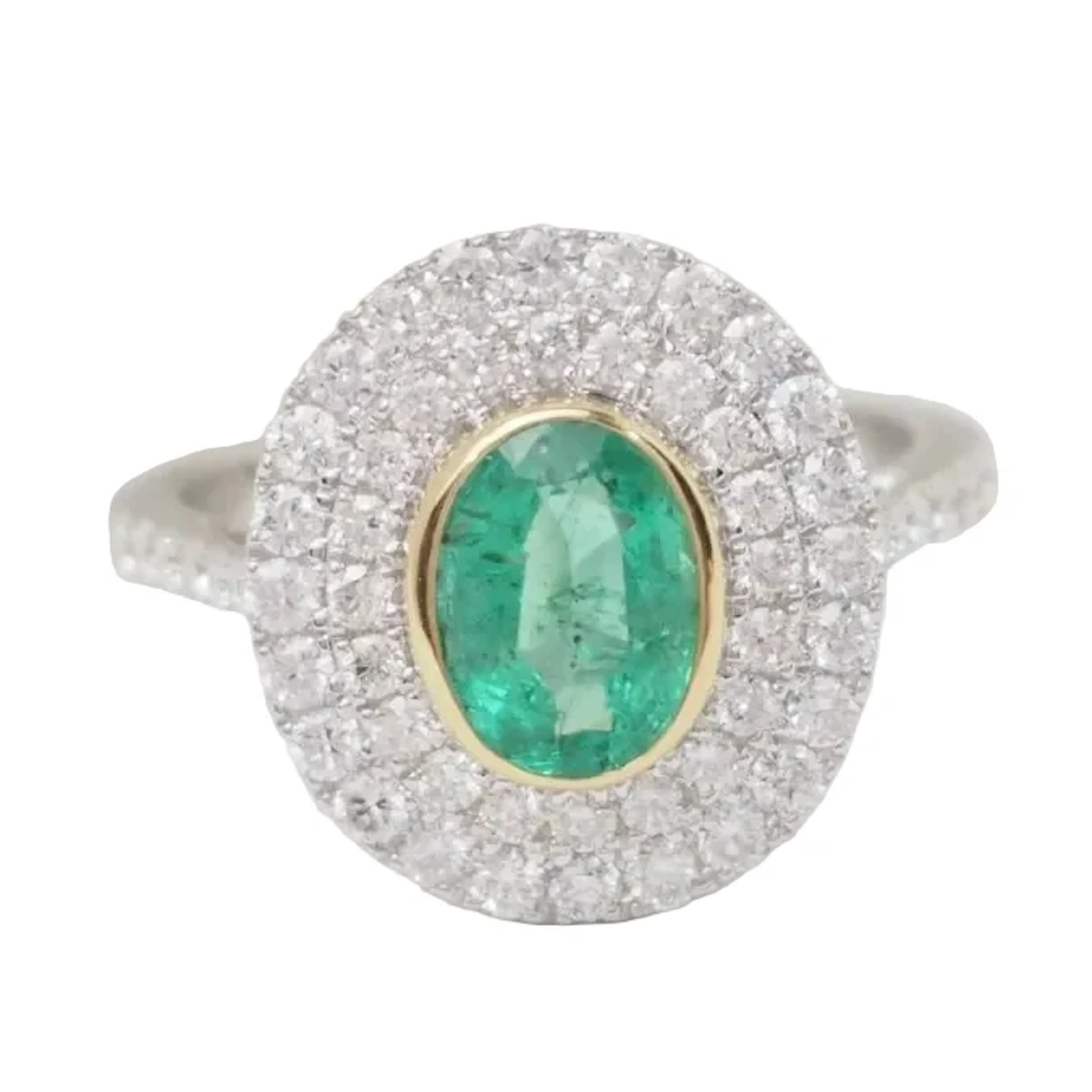 Ring double two-tone gold surround, oval emerald and diamonds