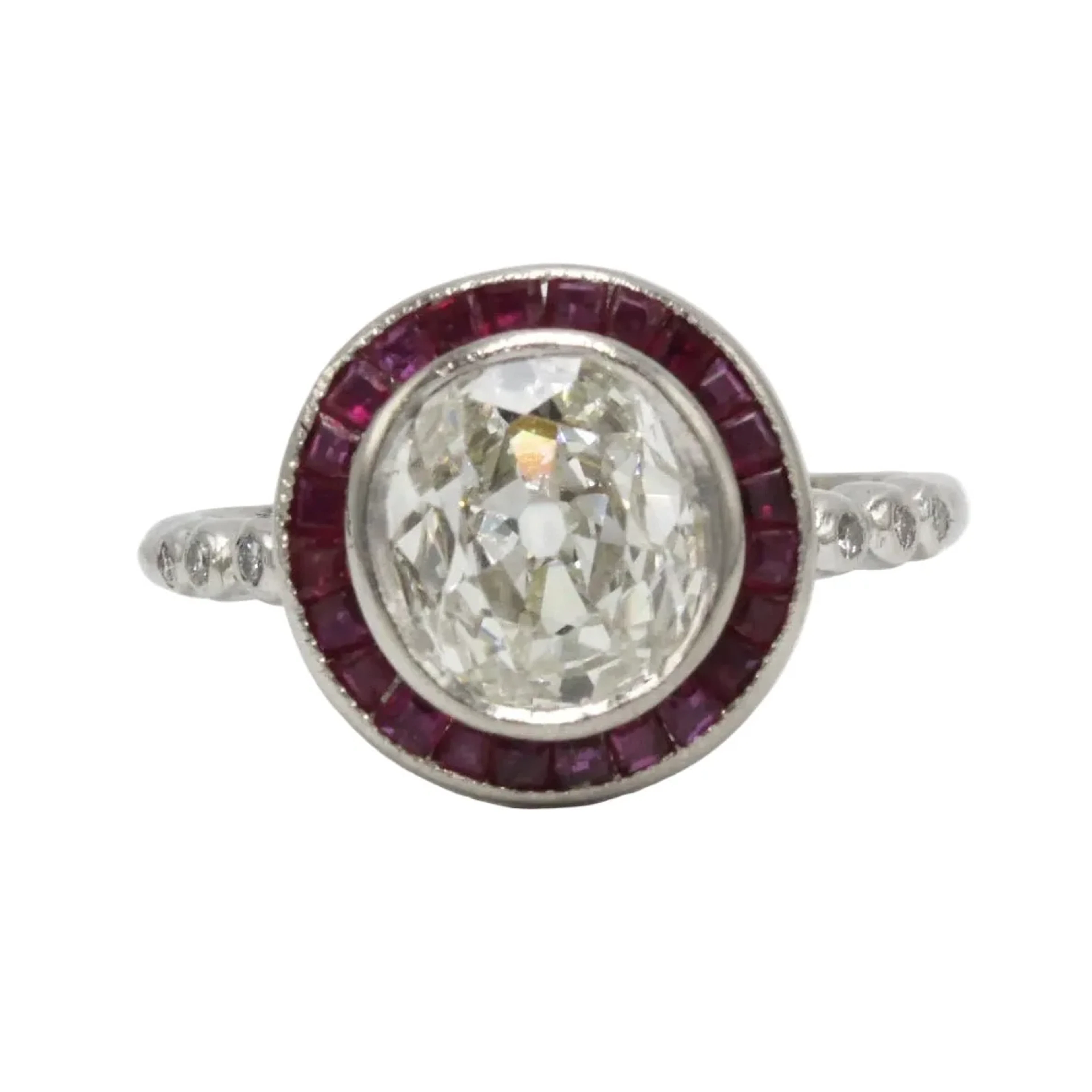 Entourage Ring in platinum, rubies, and diamonds