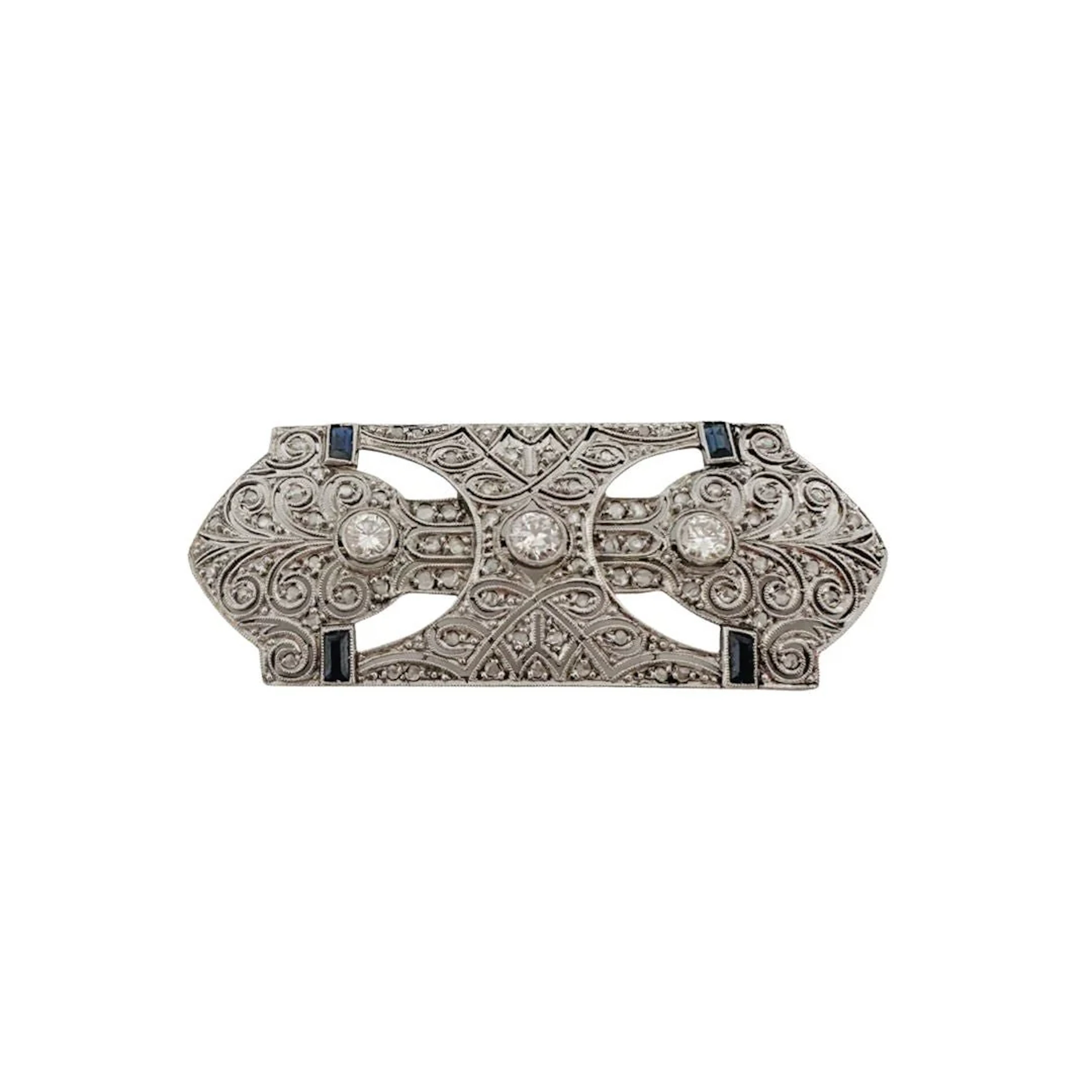 Art Deco brooch in platinum, white gold, sapphires and diamonds