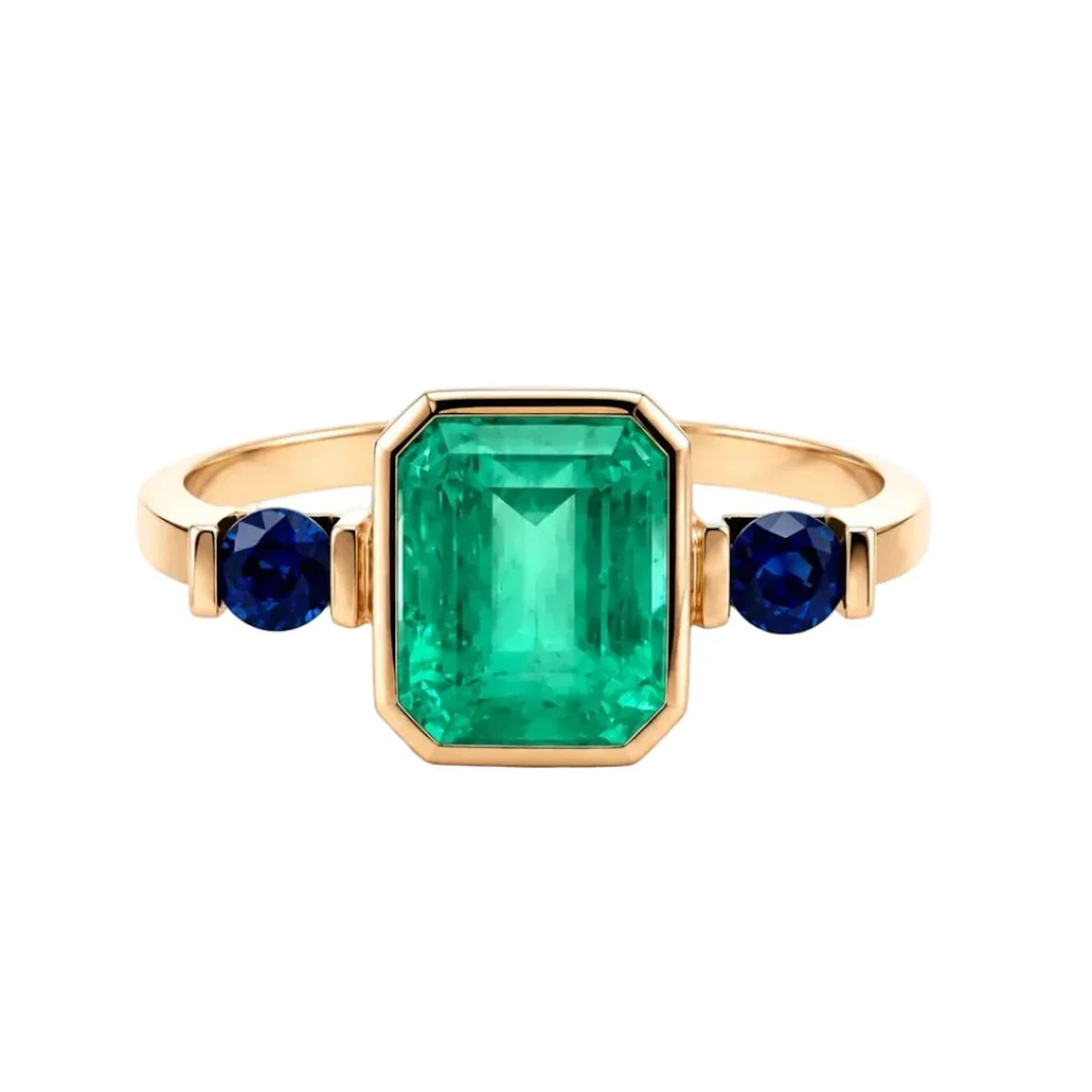 Trilogy Ring in yellow gold, emerald, and sapphires