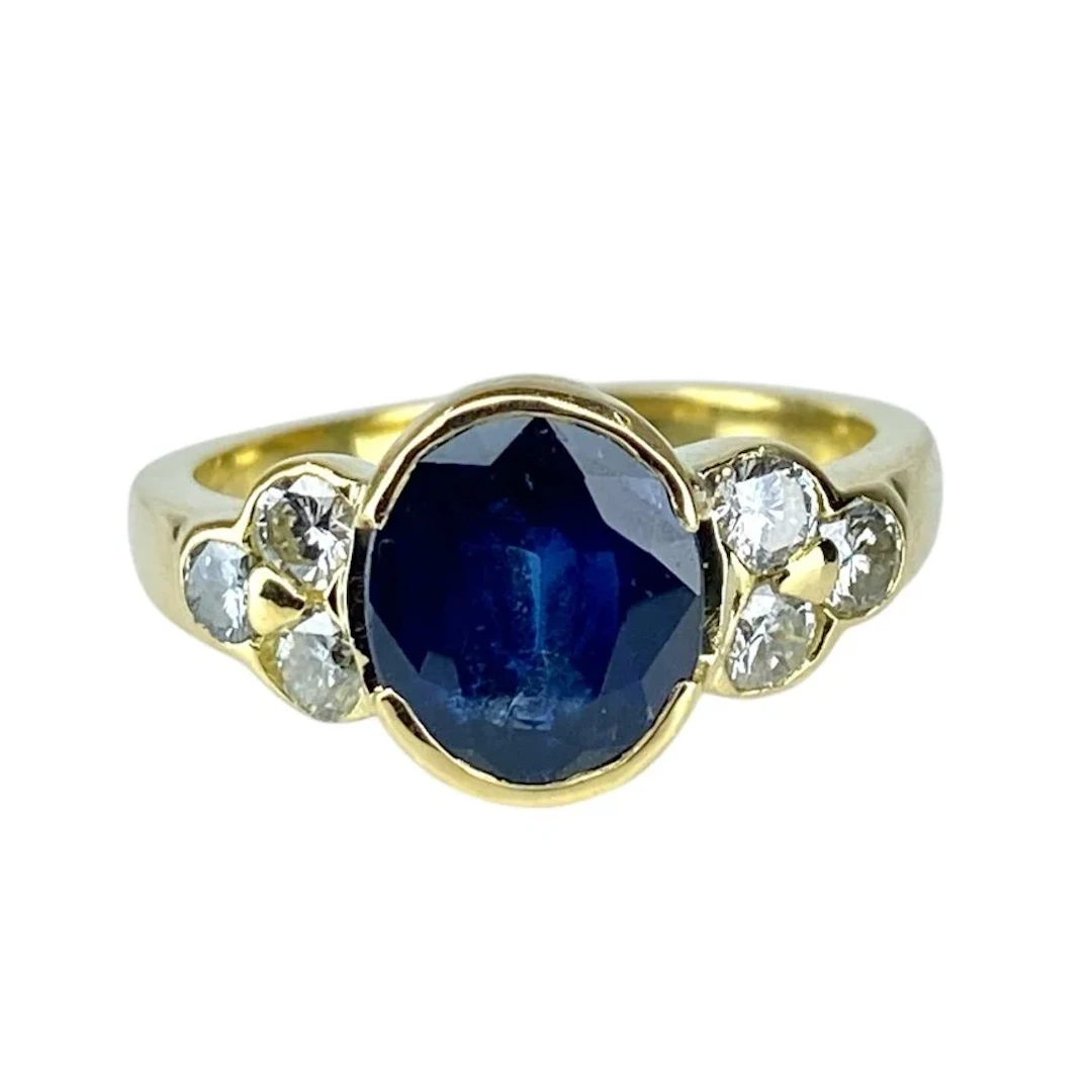 Ring in yellow gold 18 carats, sapphire and diamonds