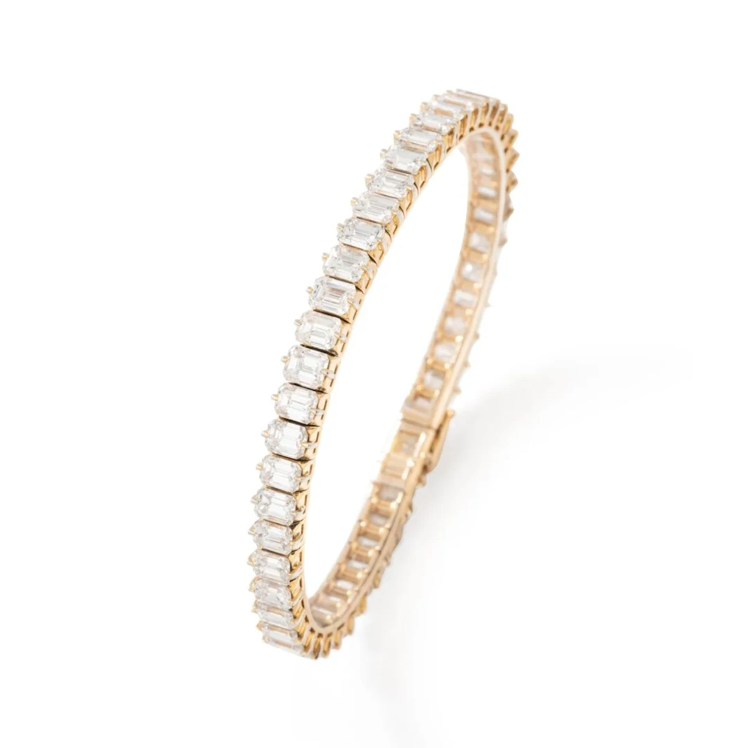 Tennis line bracelet in yellow gold, platinum and diamonds
