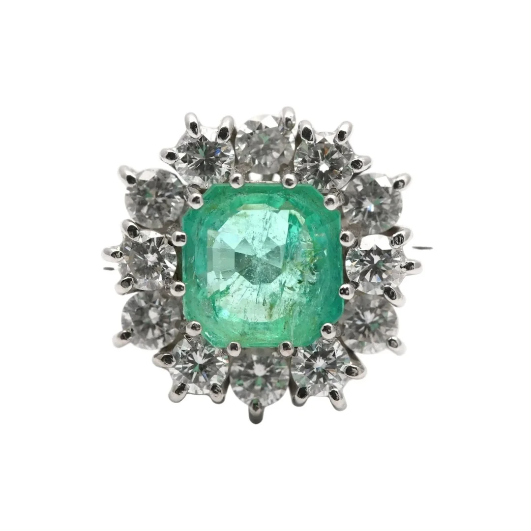 "Entourage" Ring in White Gold, Emerald, and Diamonds