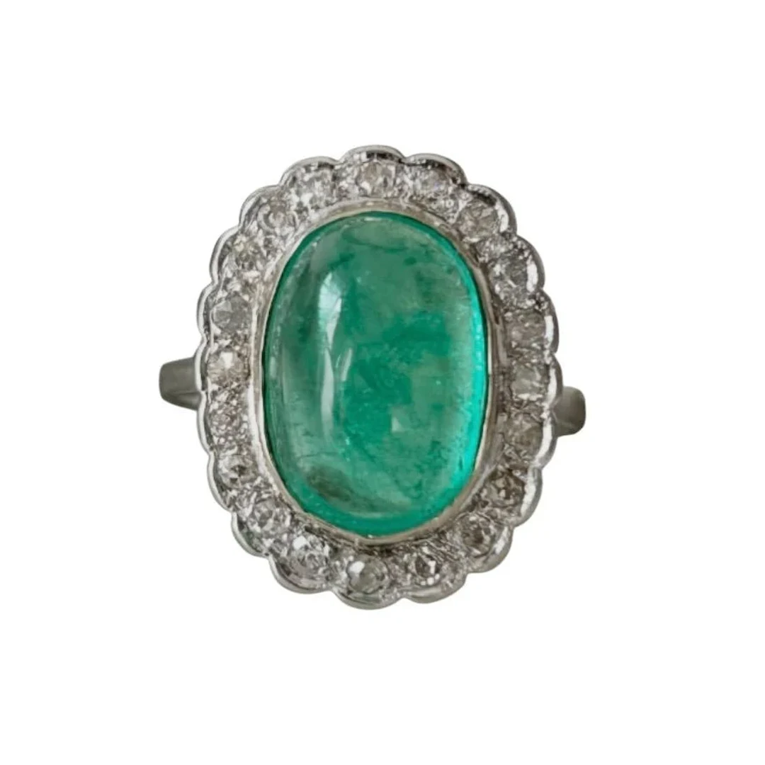"Entourage" Ring in White Gold, Emerald, and Diamonds