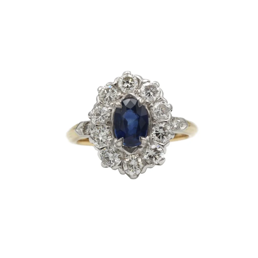 Daisy ring in yellow gold, platinum, sapphire, and diamonds