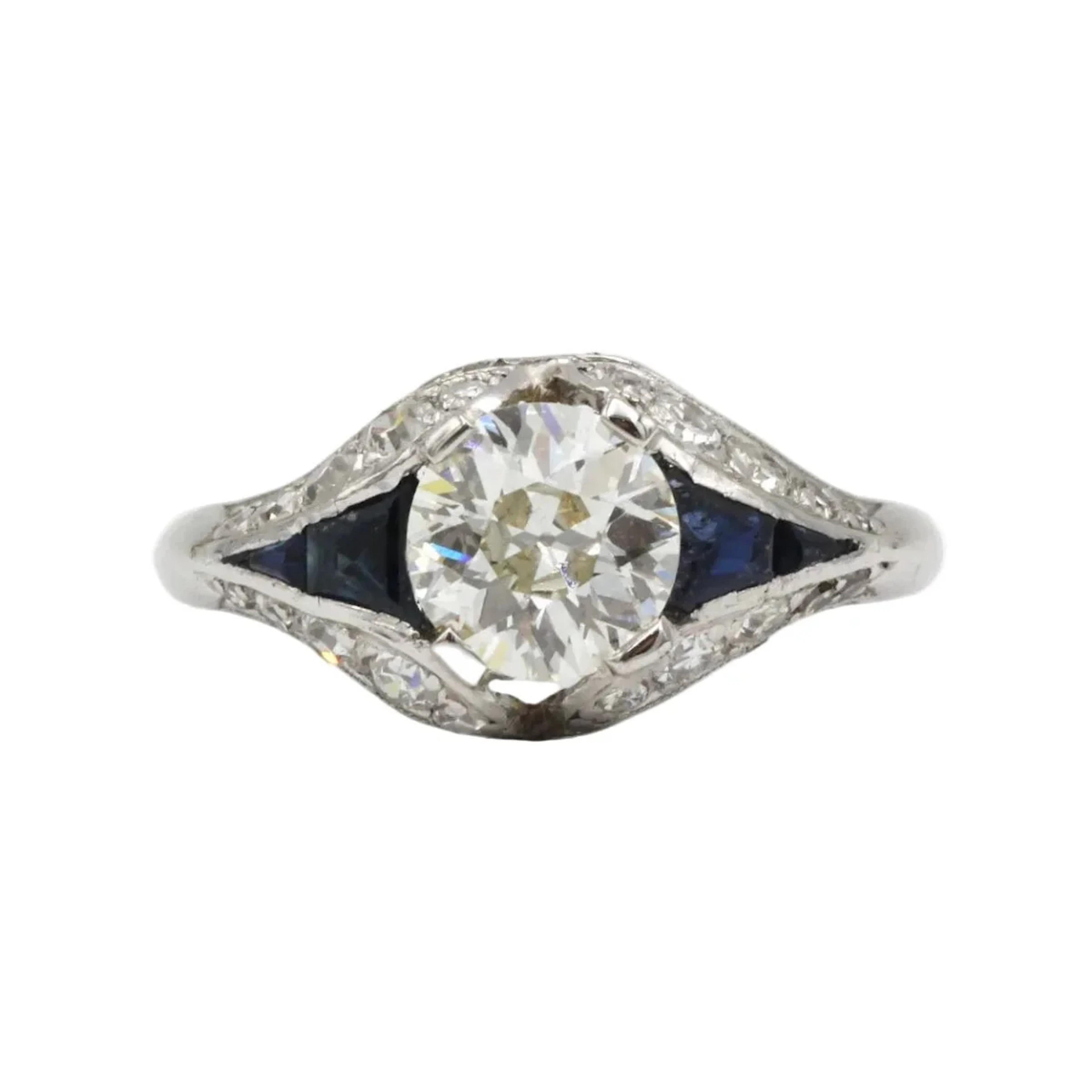 Entourage Ring in platinum, sapphires, and diamonds