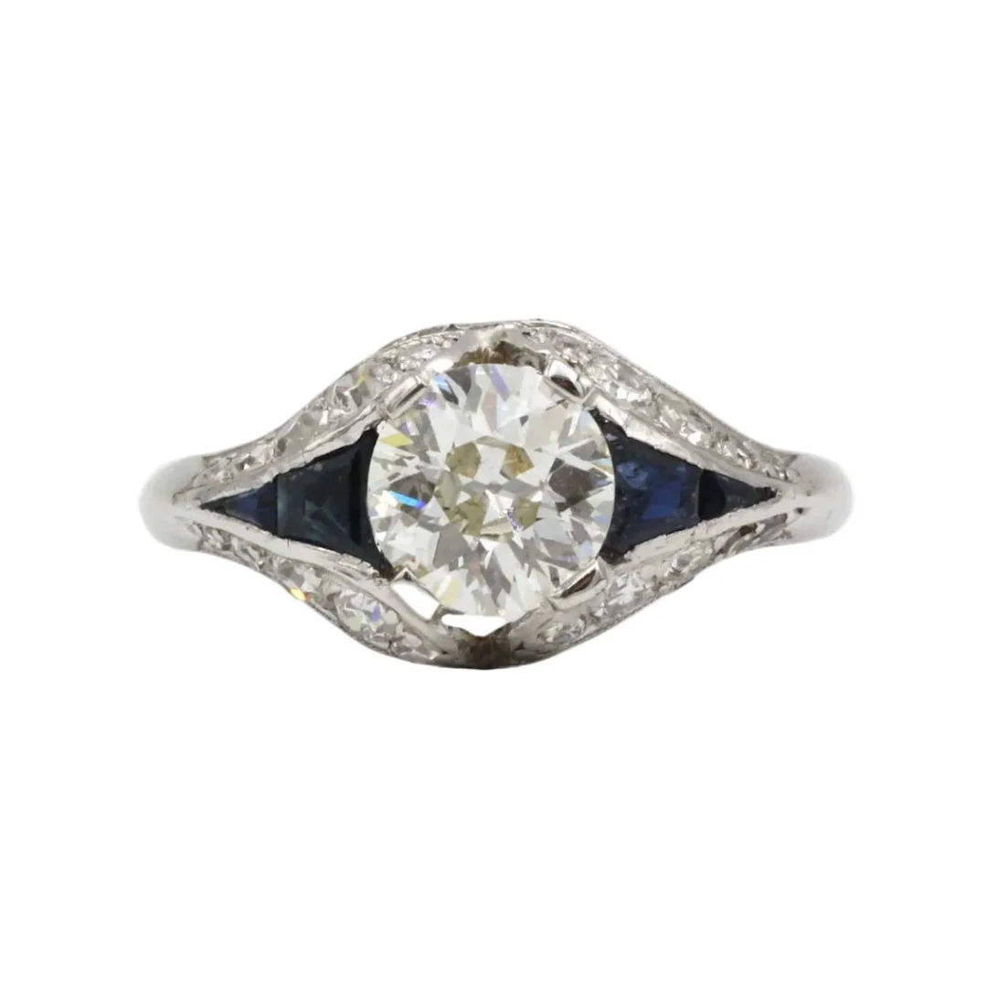 Entourage Ring in platinum, sapphires, and diamonds