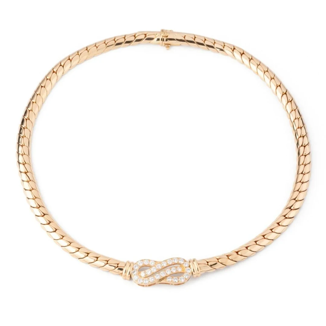 VAN CLEEF & ARPELS English Mesh necklace in yellow gold and diamonds