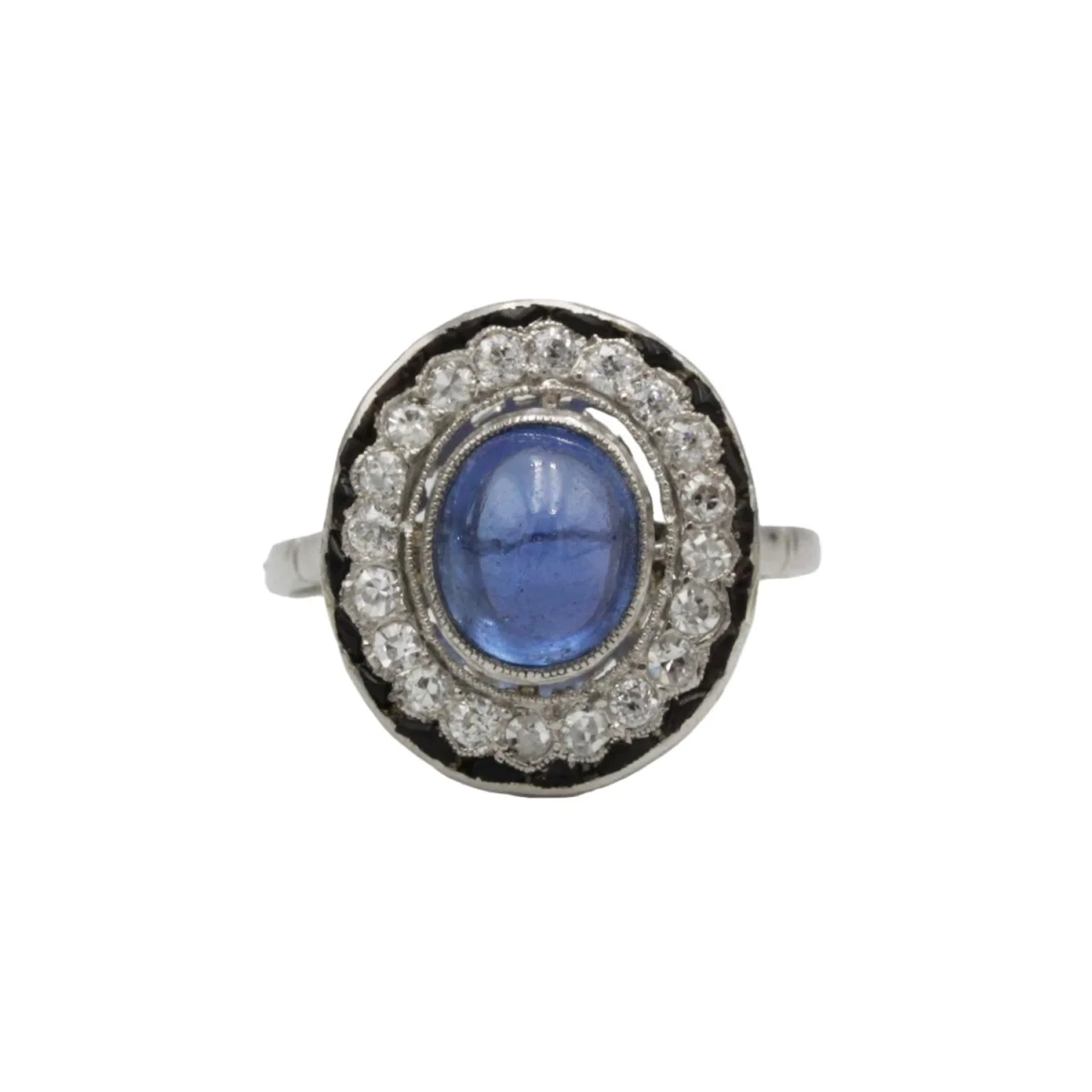 Daisy ring in platinum, sapphire, onyx and diamonds