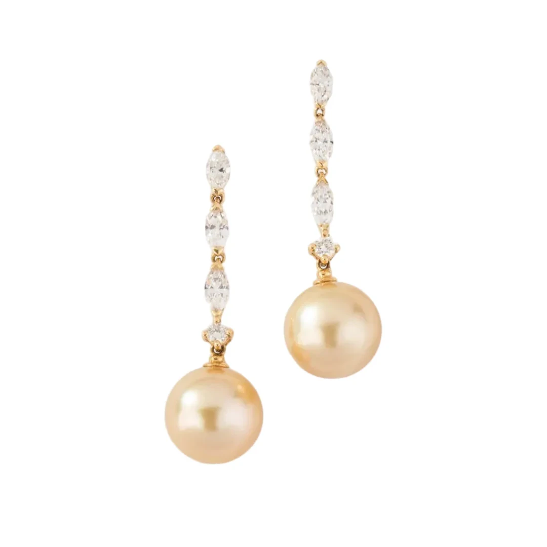 Pair of yellow gold earrings with shuttle diamonds and South Sea gold pearls