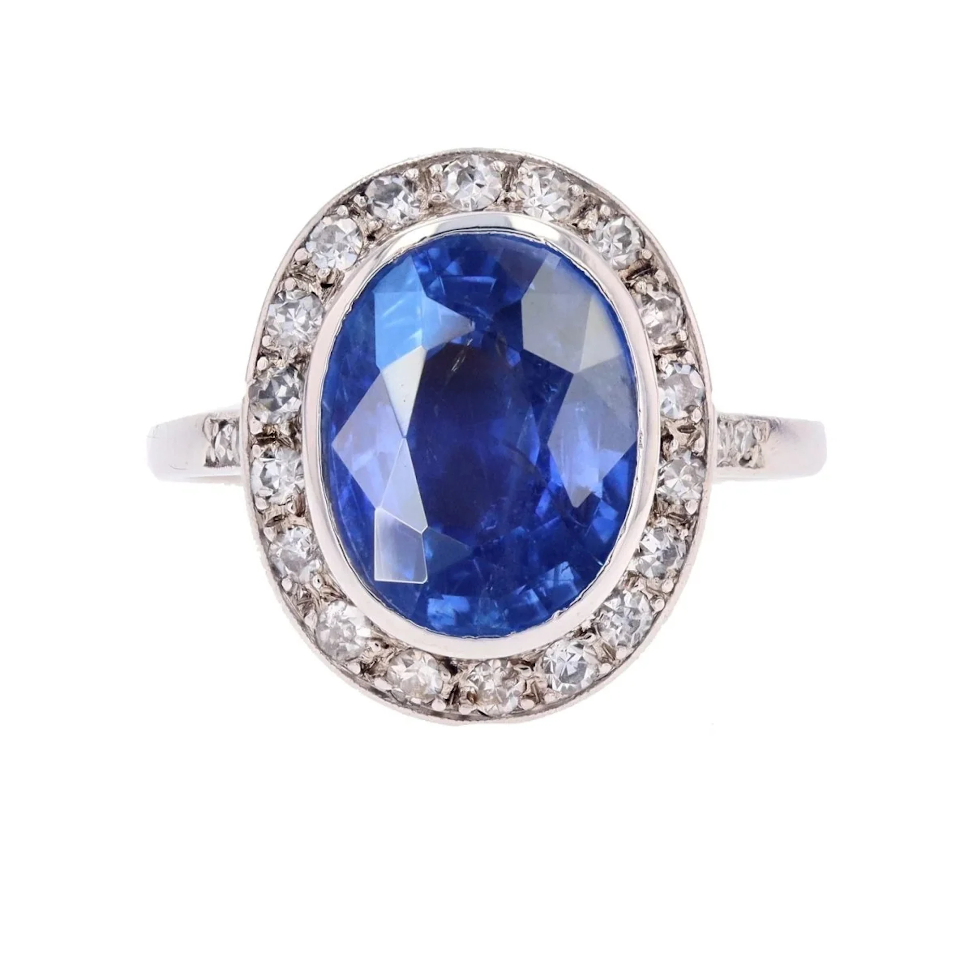 Entourage Ring in Platinum, Sapphire, and Diamonds
