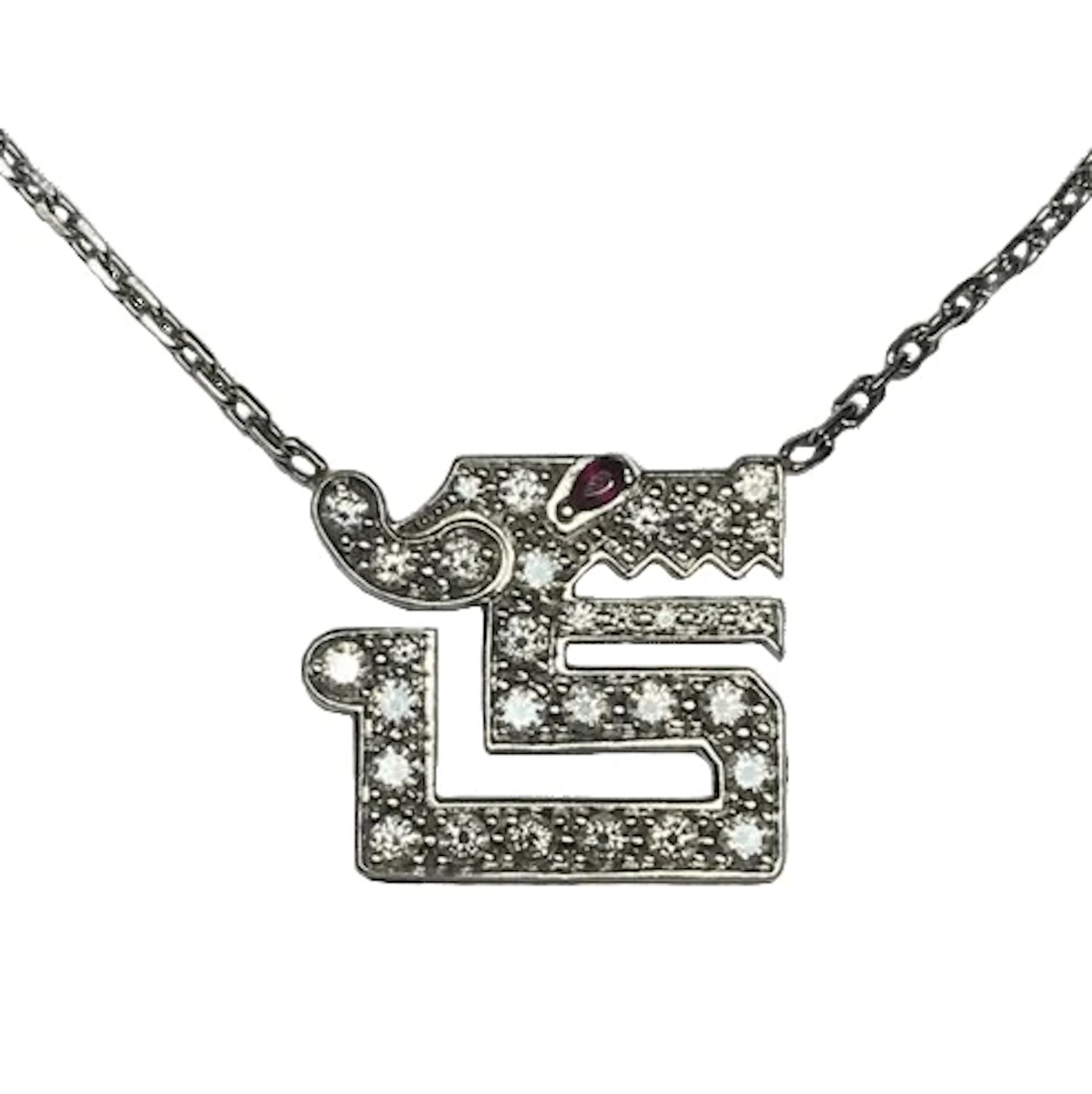 CARTIER "Dragon's Kiss" Pendant Necklace in white gold, rubies, and diamonds