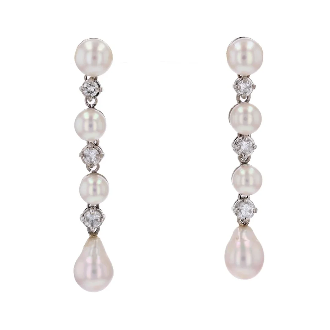 Earrings Hanging in white gold, pearls and diamonds