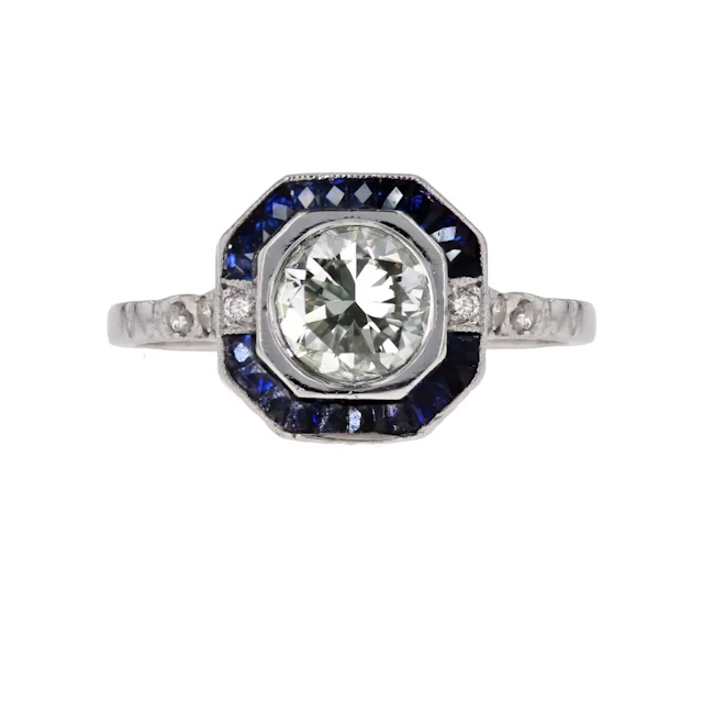 Bague Entourage en platine, saphirs et diamants