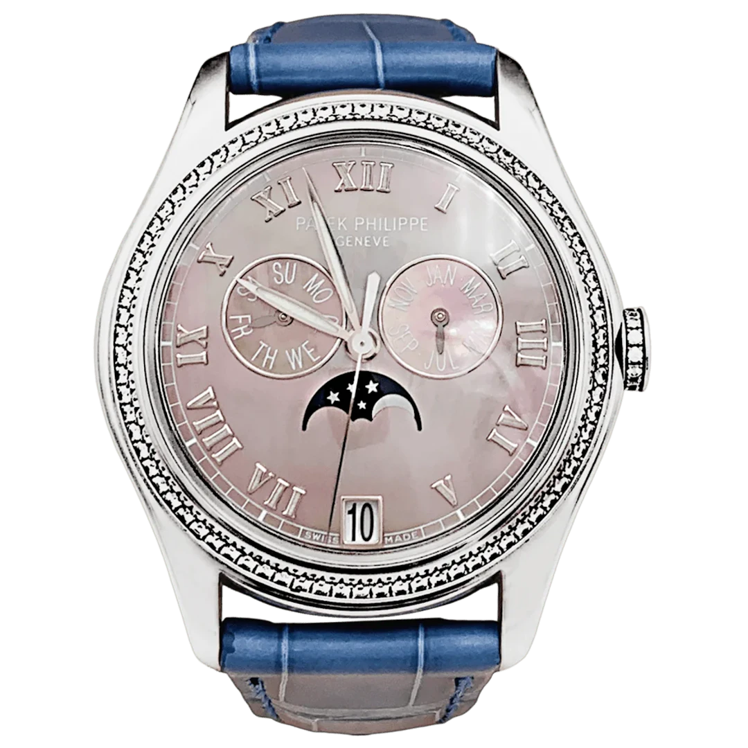 Montre PATEK PHILIPPE "Annual Calendar" en or blanc, cuir et diamants