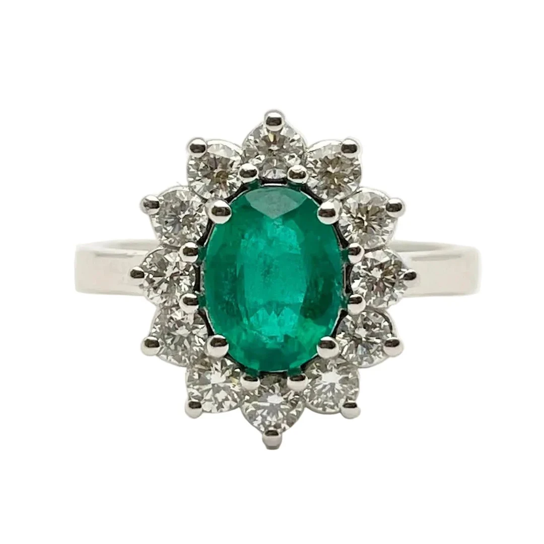 Bague Entourage en or blanc, émeraude et diamants