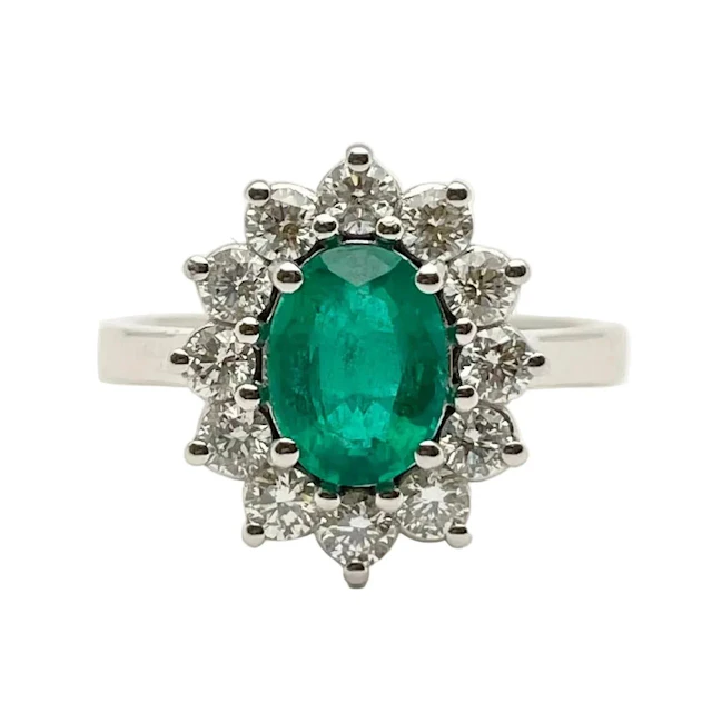 Bague Entourage en or blanc, émeraude et diamants