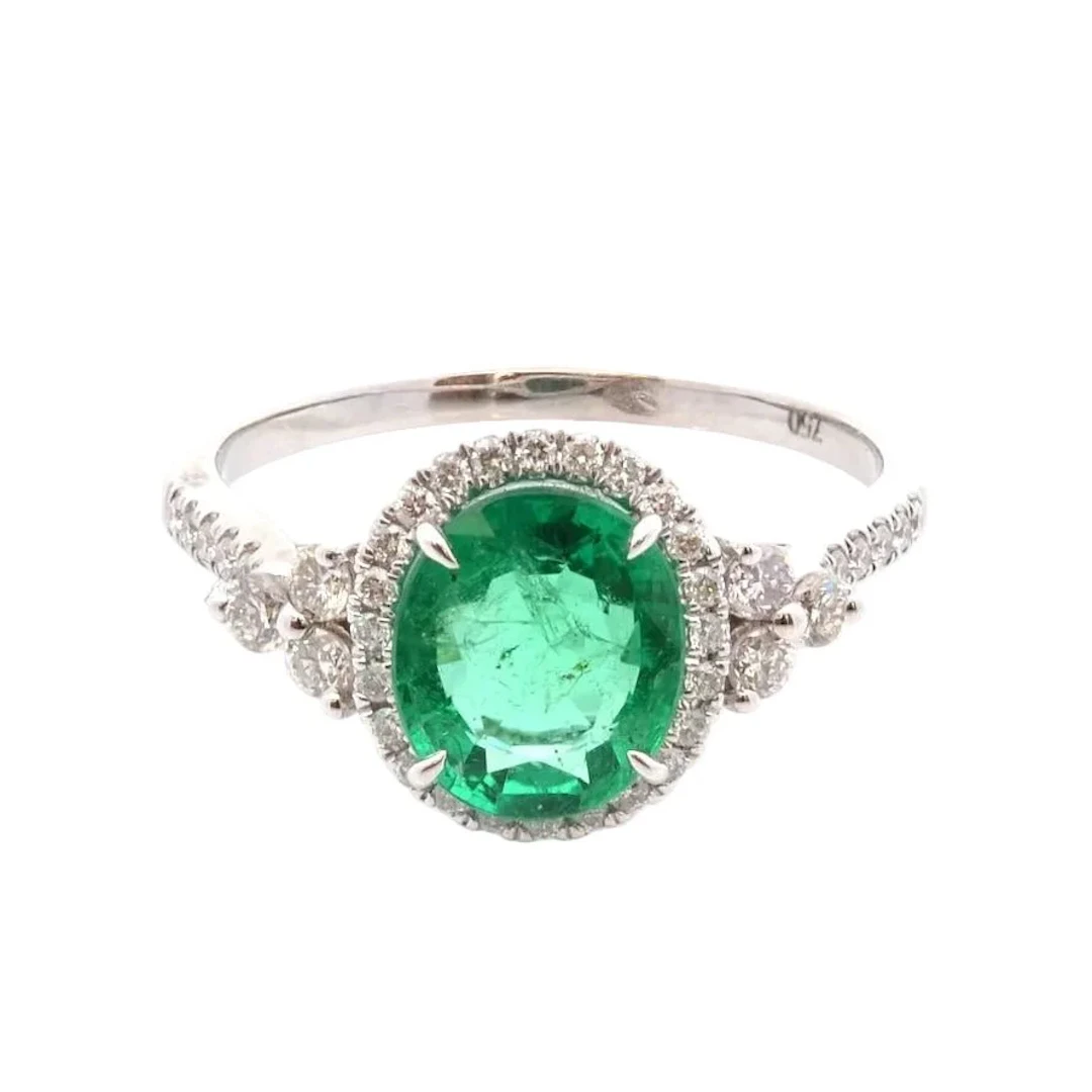 "Entourage" Ring in White Gold, Emerald, and Diamonds