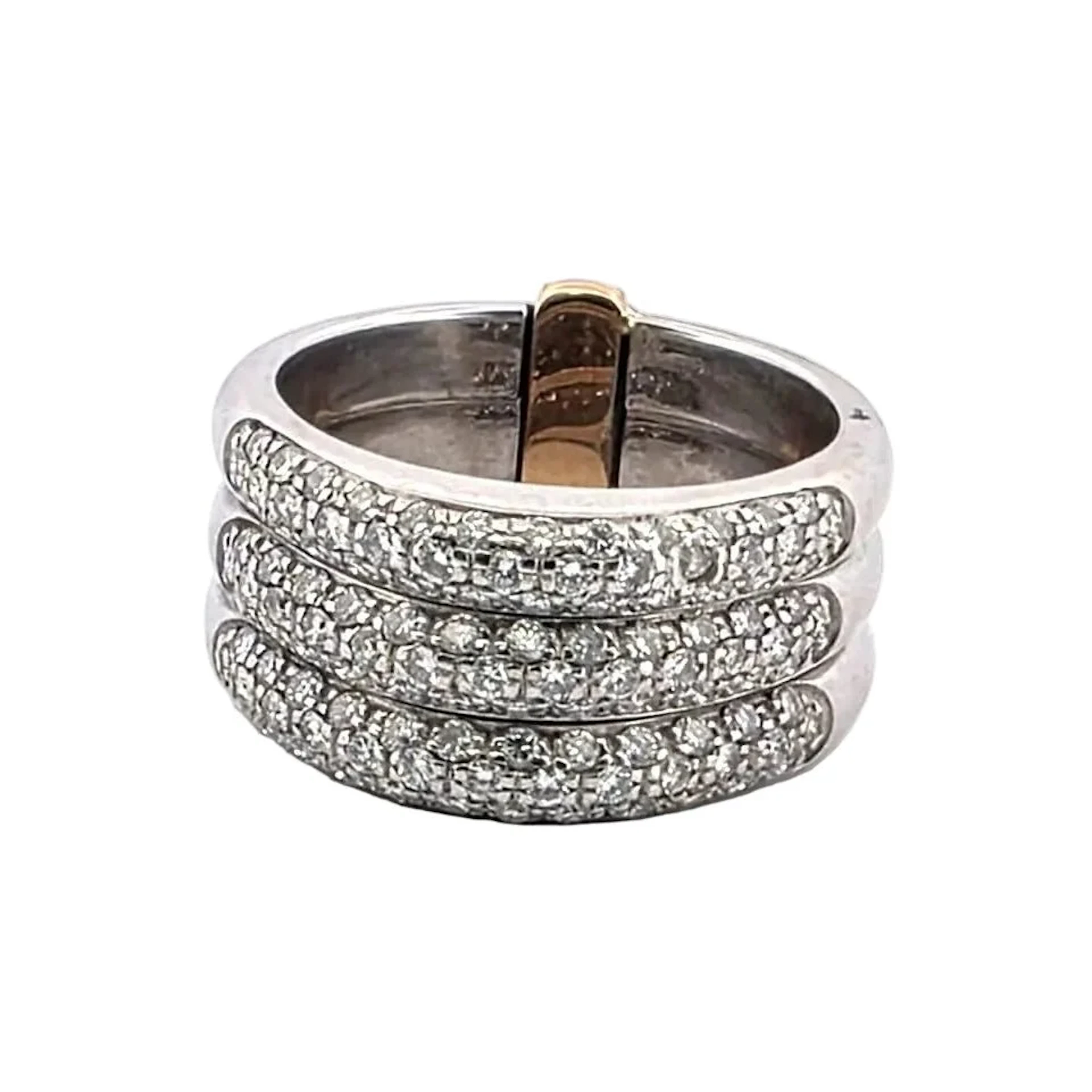 Ring Paved in white gold, yellow gold and diamonds.