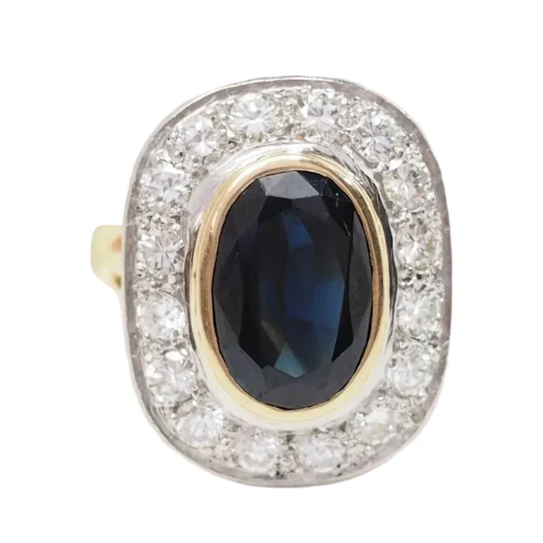Pompadour Ring in white gold, yellow gold, sapphire, and diamonds