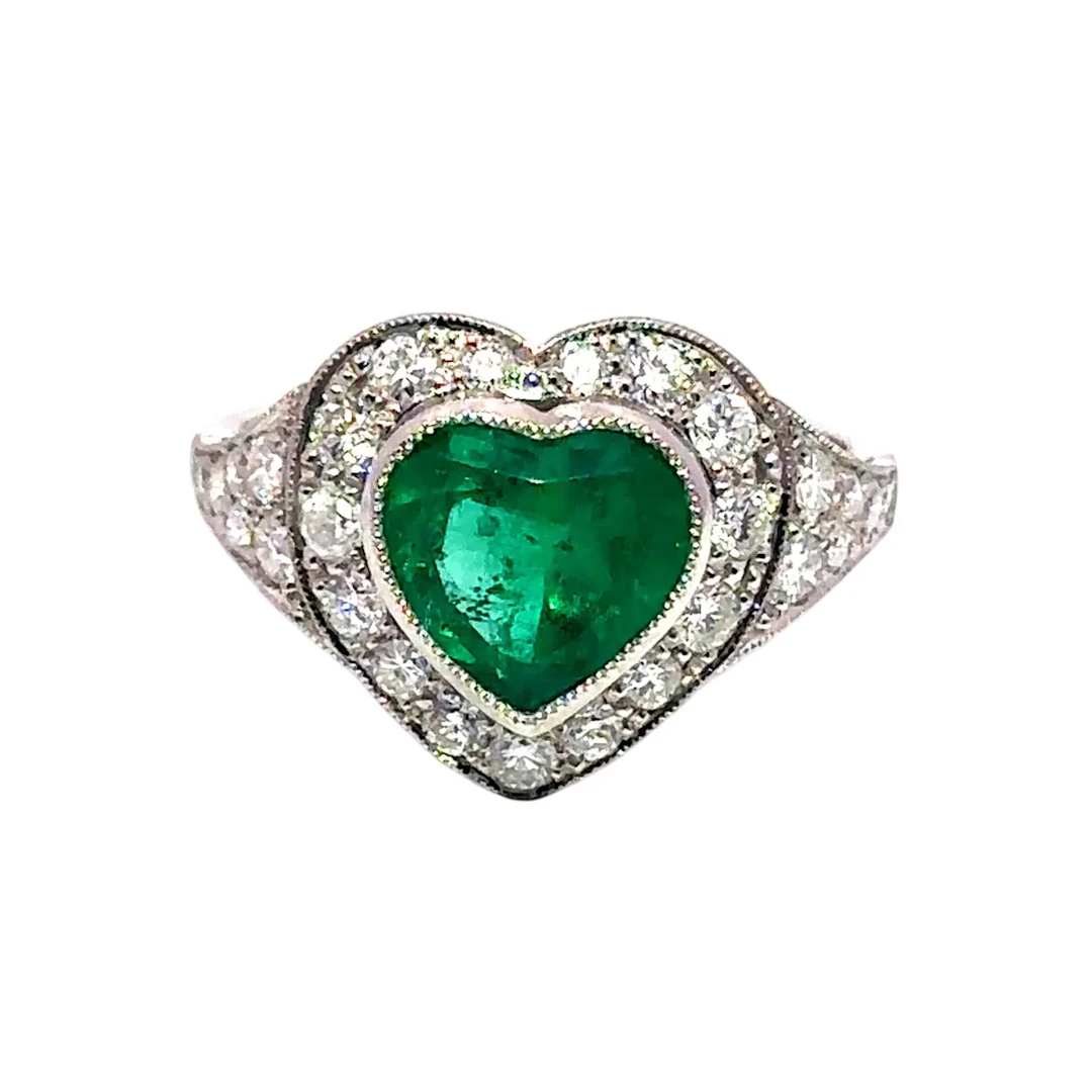 Entourage Ring in Platinum, Emerald, and Diamonds