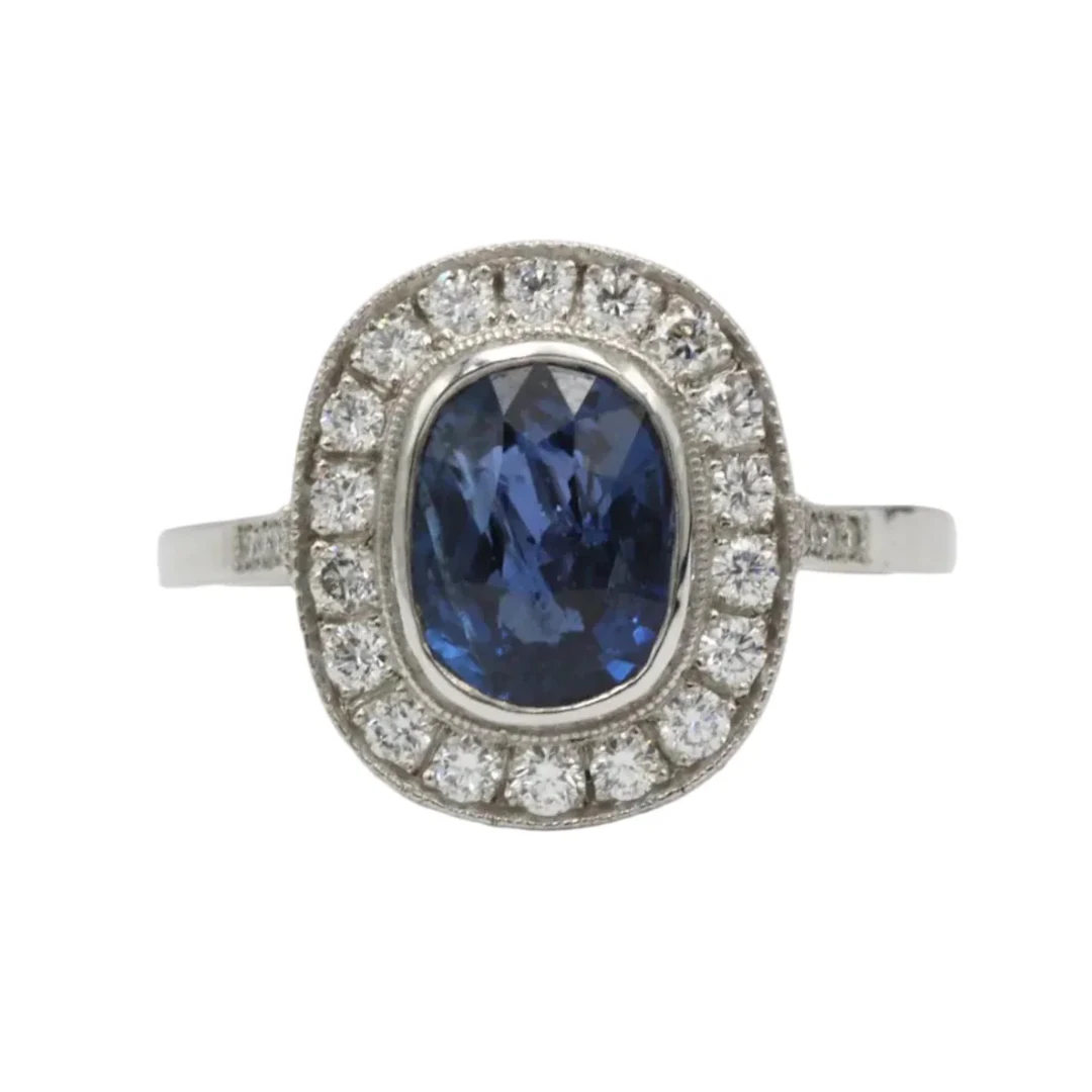 Entourage Ring in Platinum, Sapphire, and Diamonds