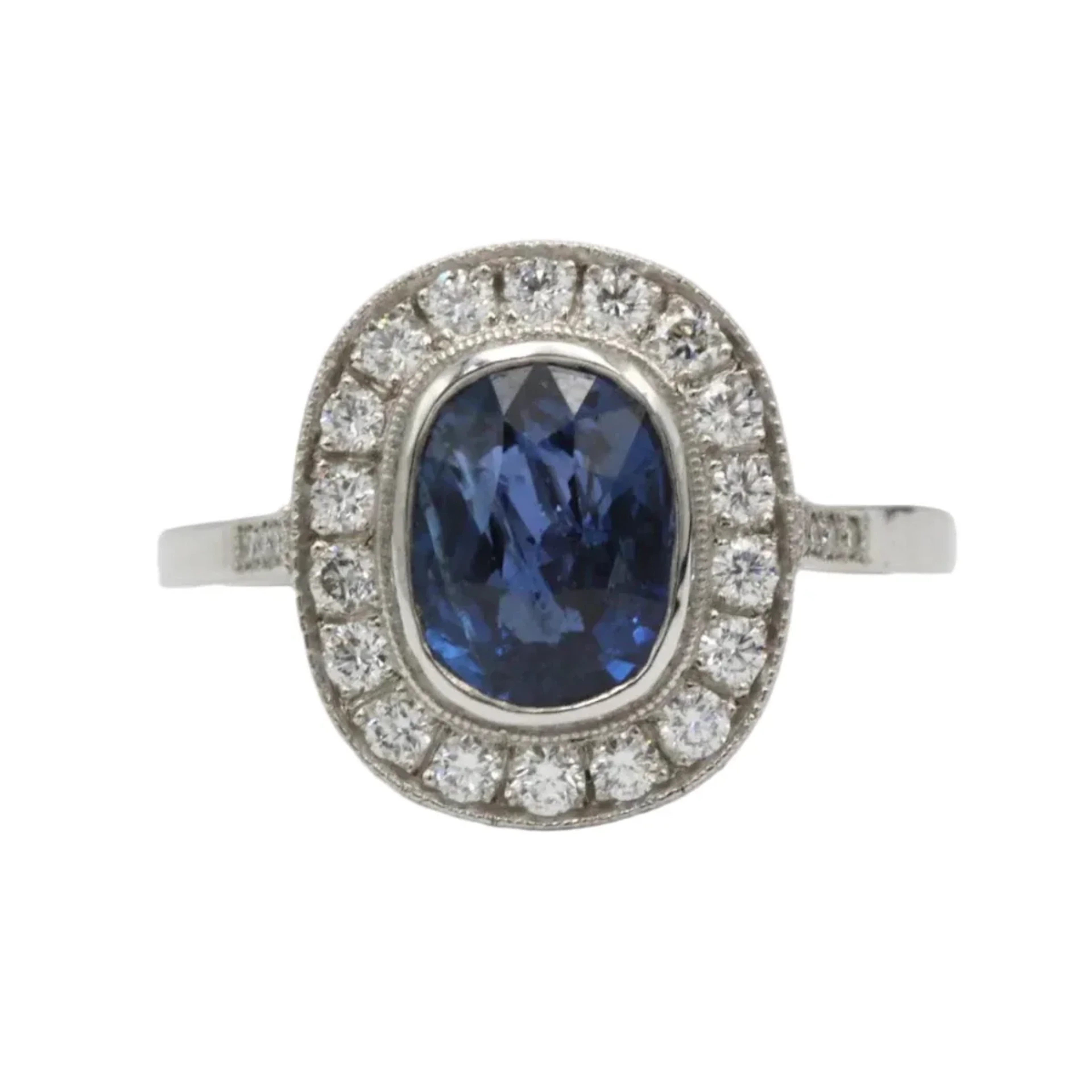 Entourage Ring in Platinum, Sapphire, and Diamonds