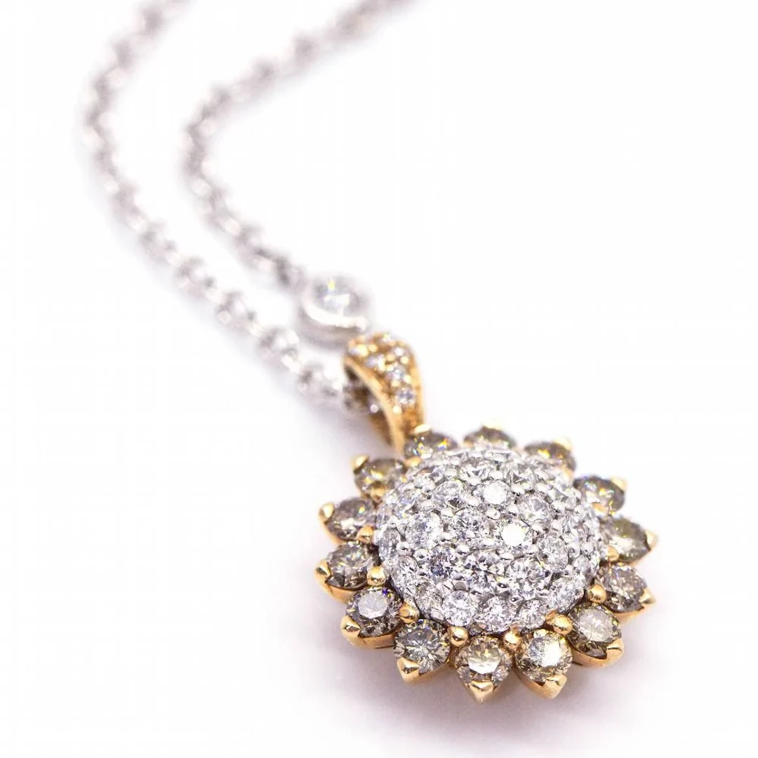 SUNFLOWER necklace in pink gold and diamonds.