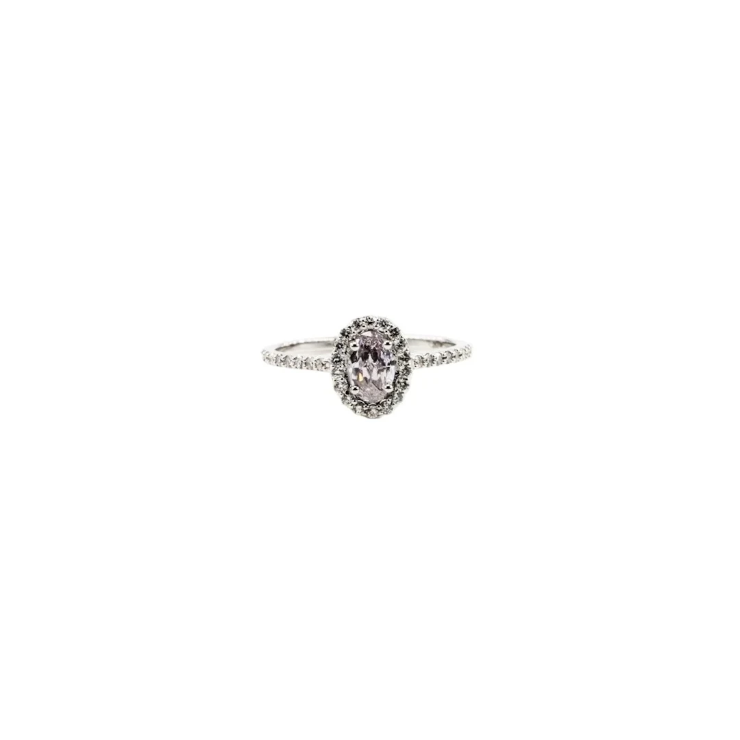 Entourage Ring in white gold, fancy light purplish pink diamonds and diamonds