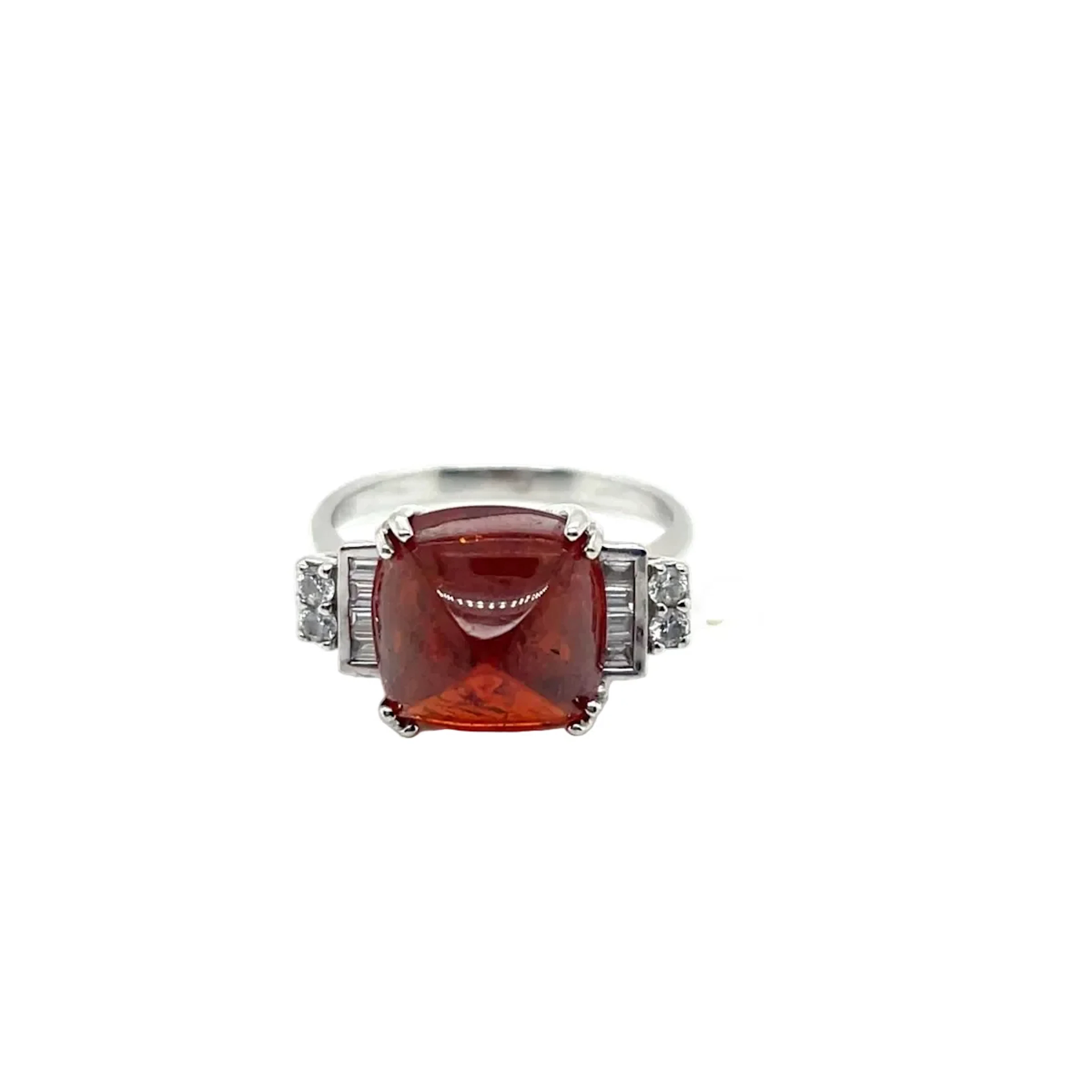 White gold ring with garnet and diamonds