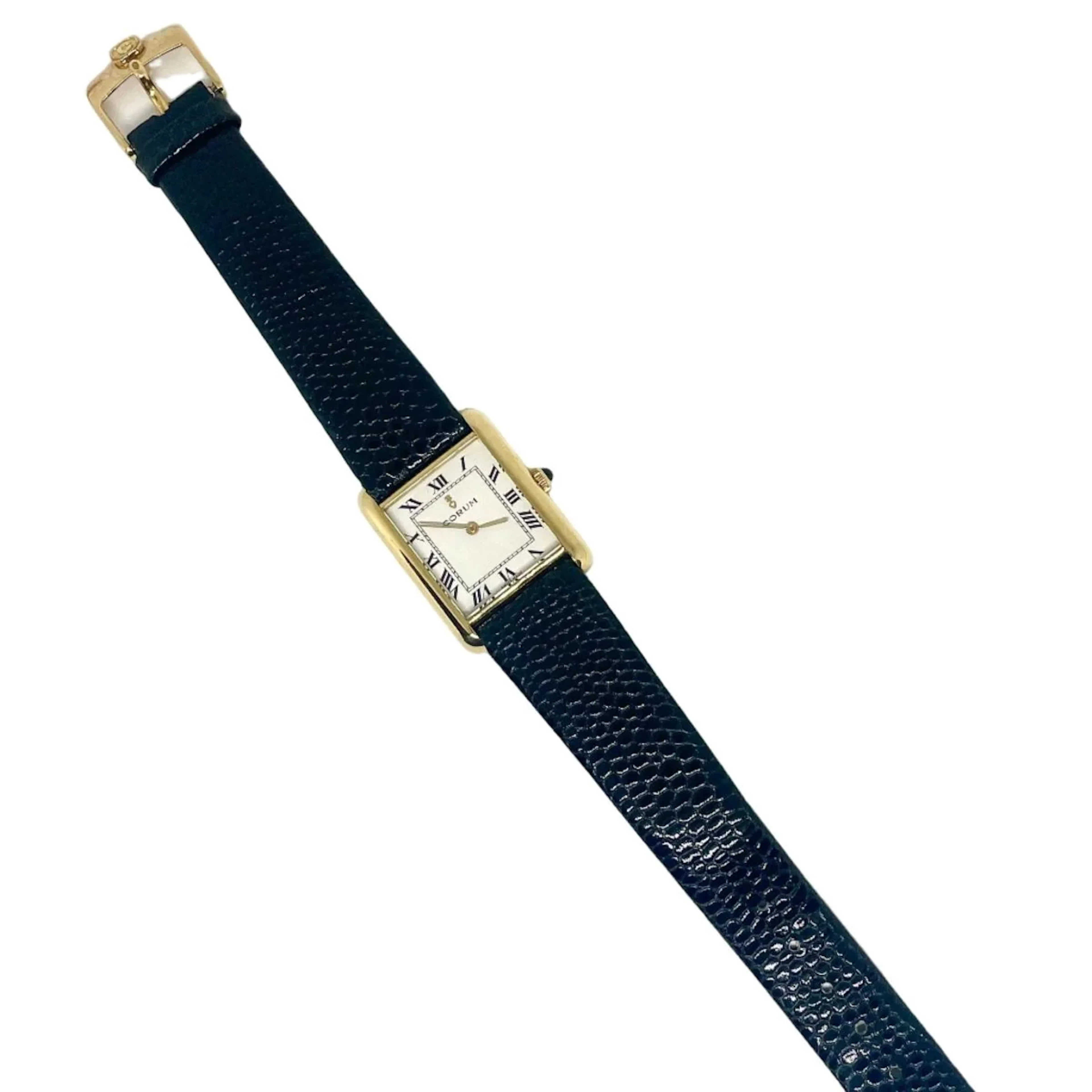 CORUM "Tank" watch in yellow gold and leather
