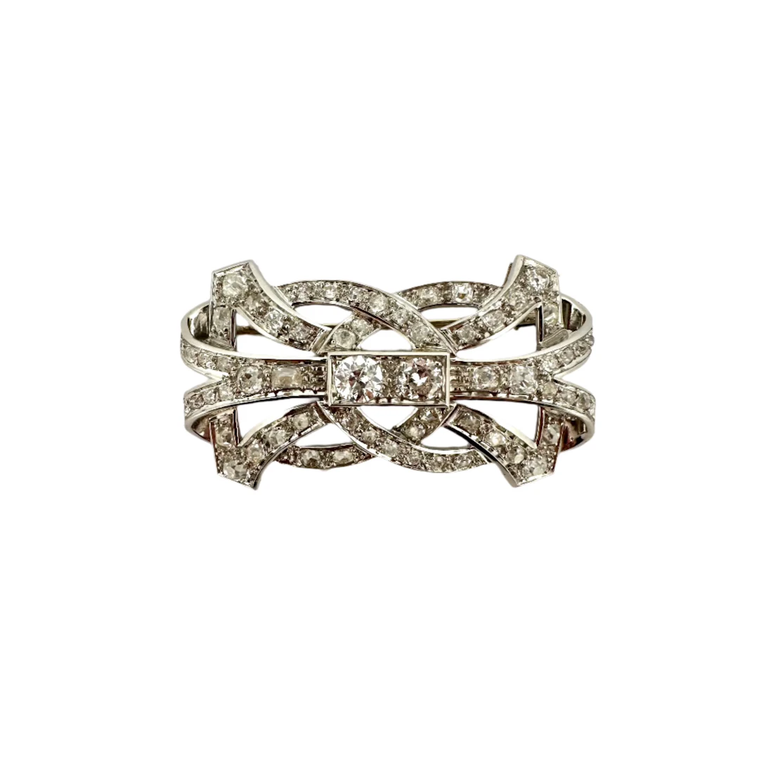 Brooch plate in paltinium, white gold and diamonds
