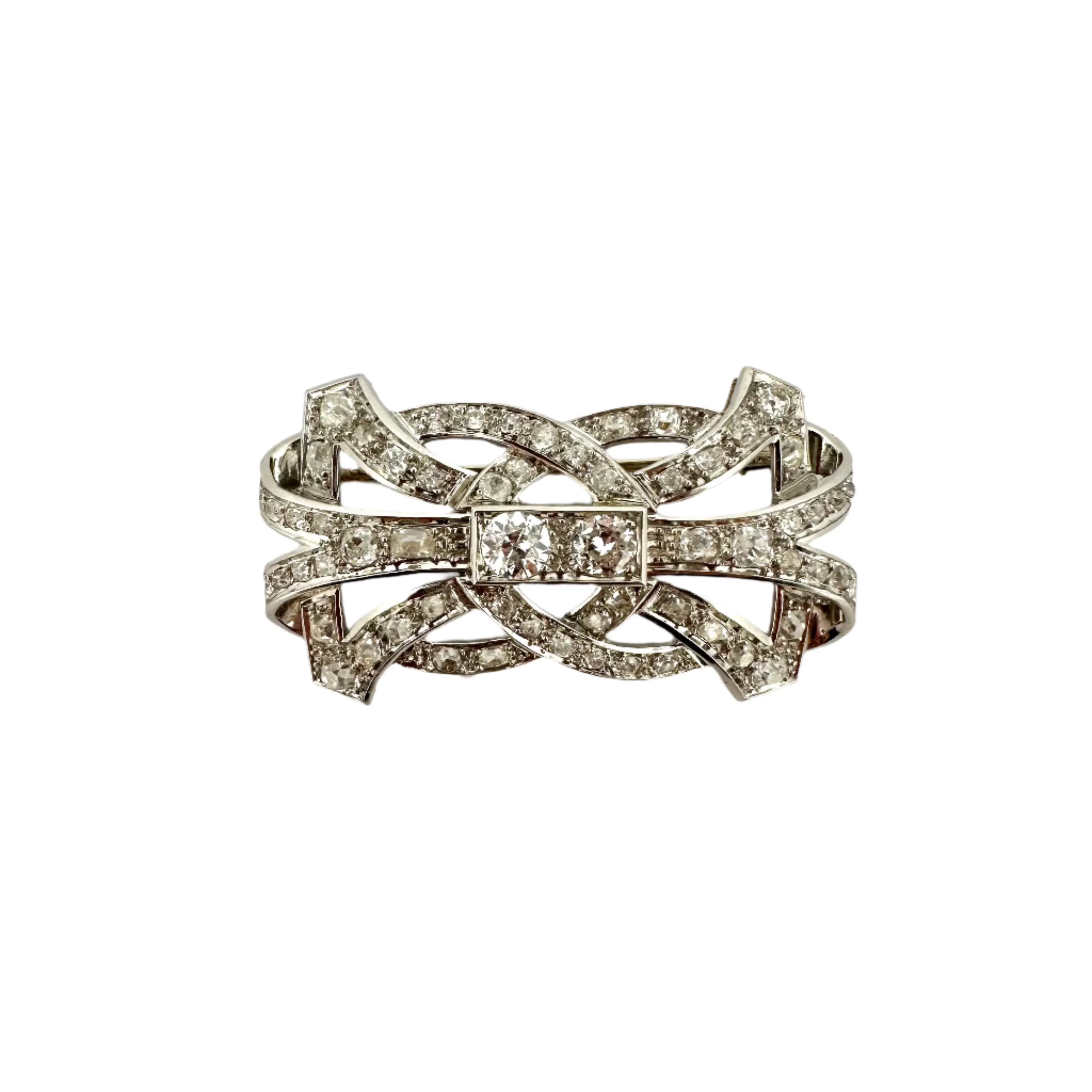 Brooch plate in paltinium, white gold and diamonds