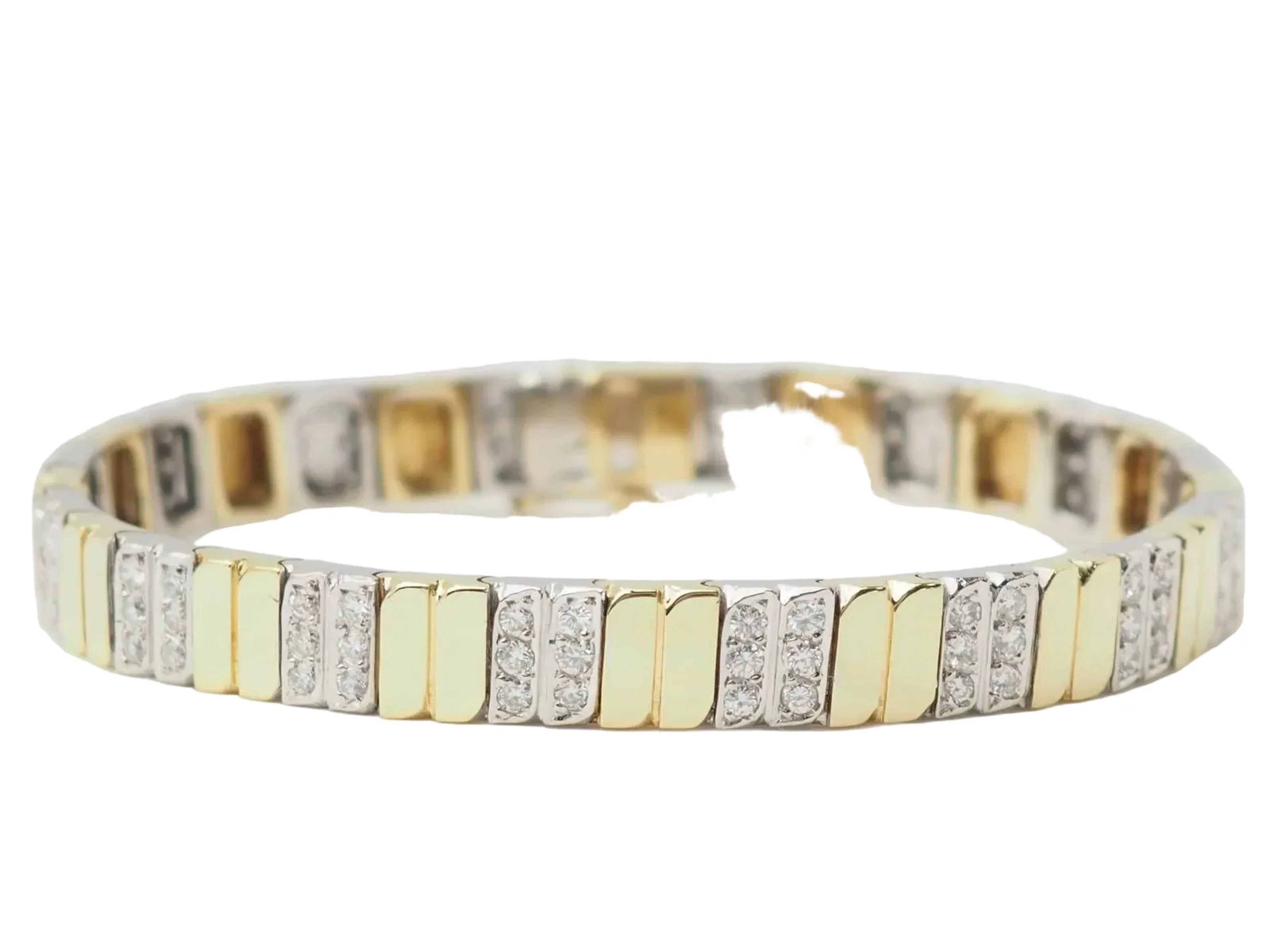Bracelet Soft in yellow gold, white gold and diamonds.