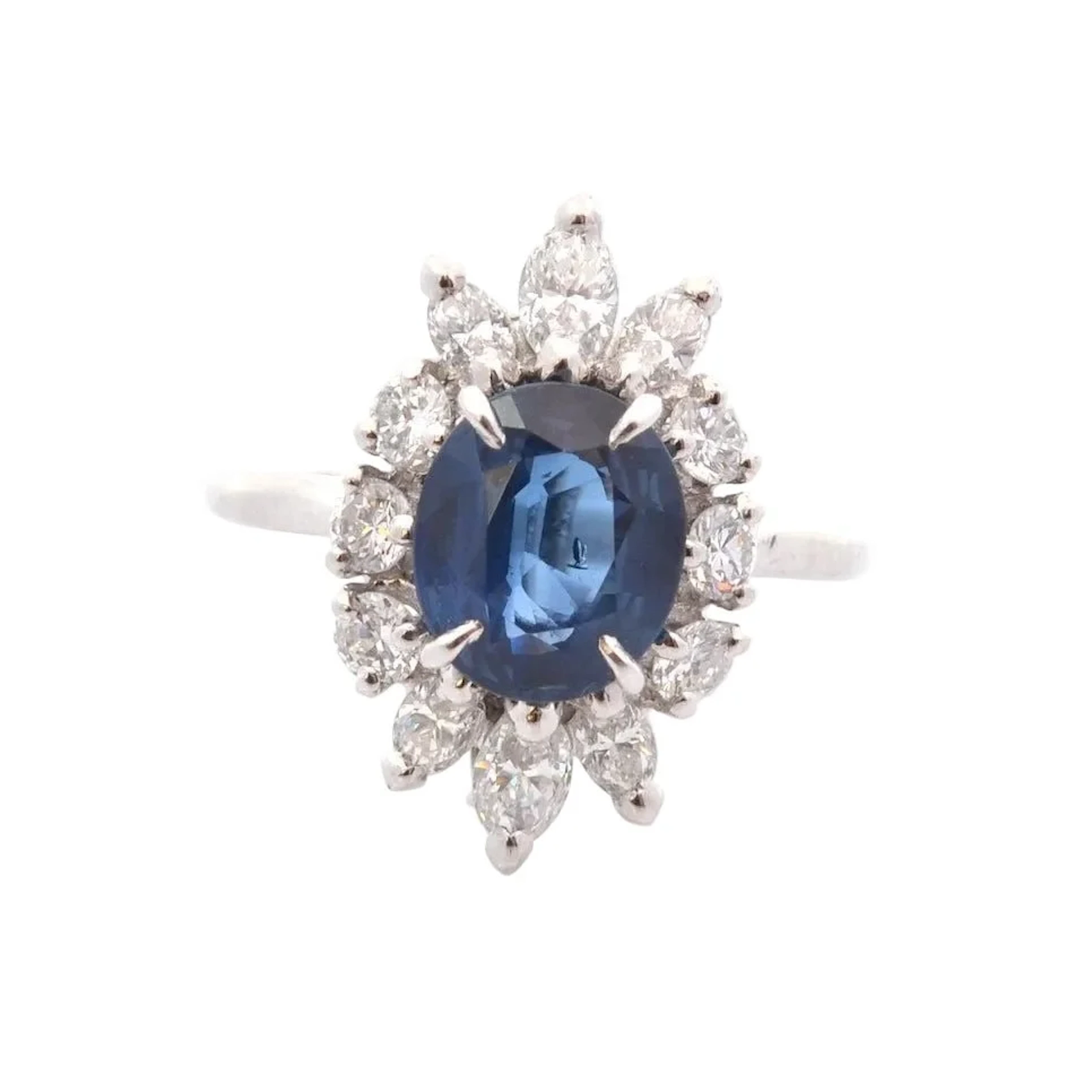 Marguerite ring in platinum, sapphire and diamonds