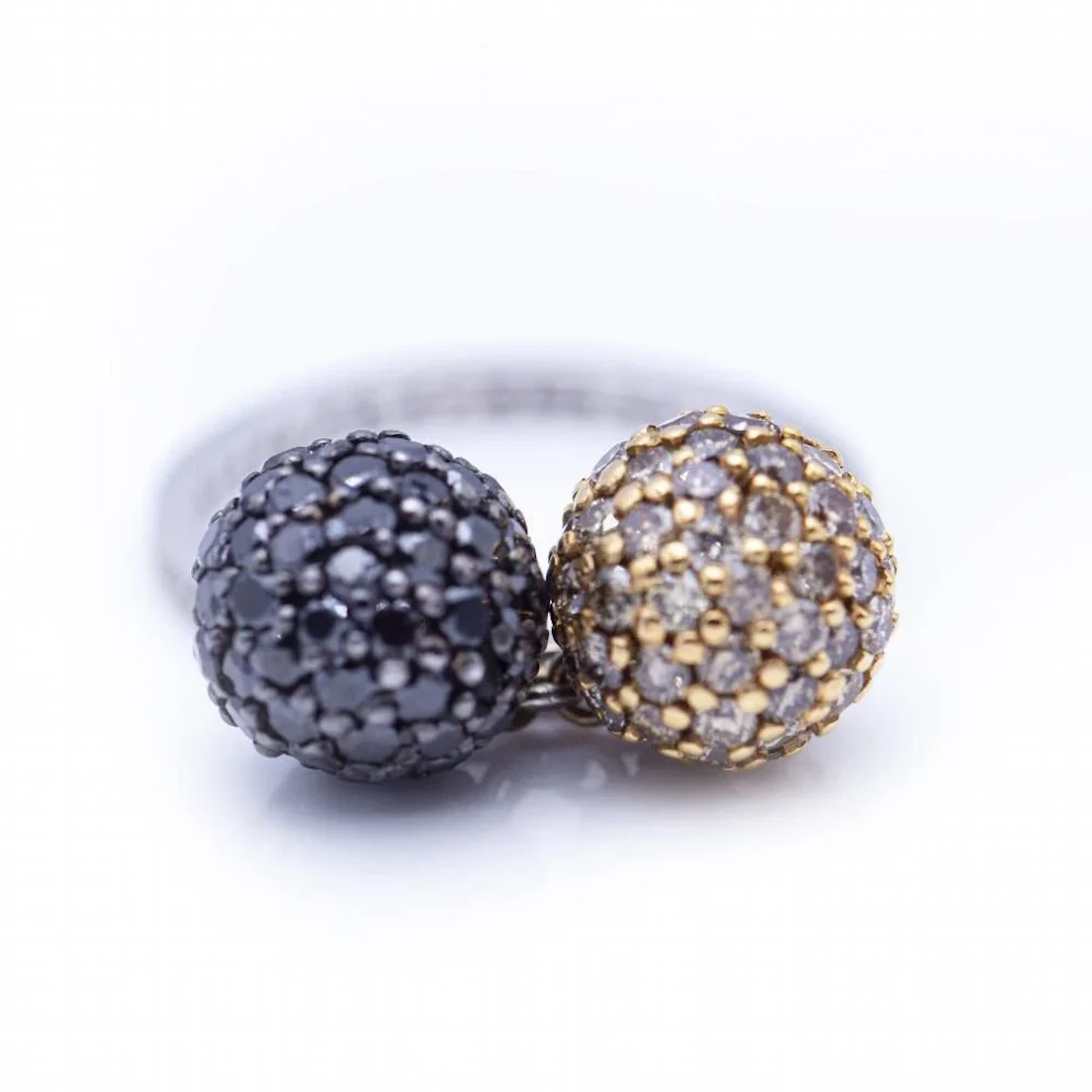 Ring at yellow gold, white gold and diamonds