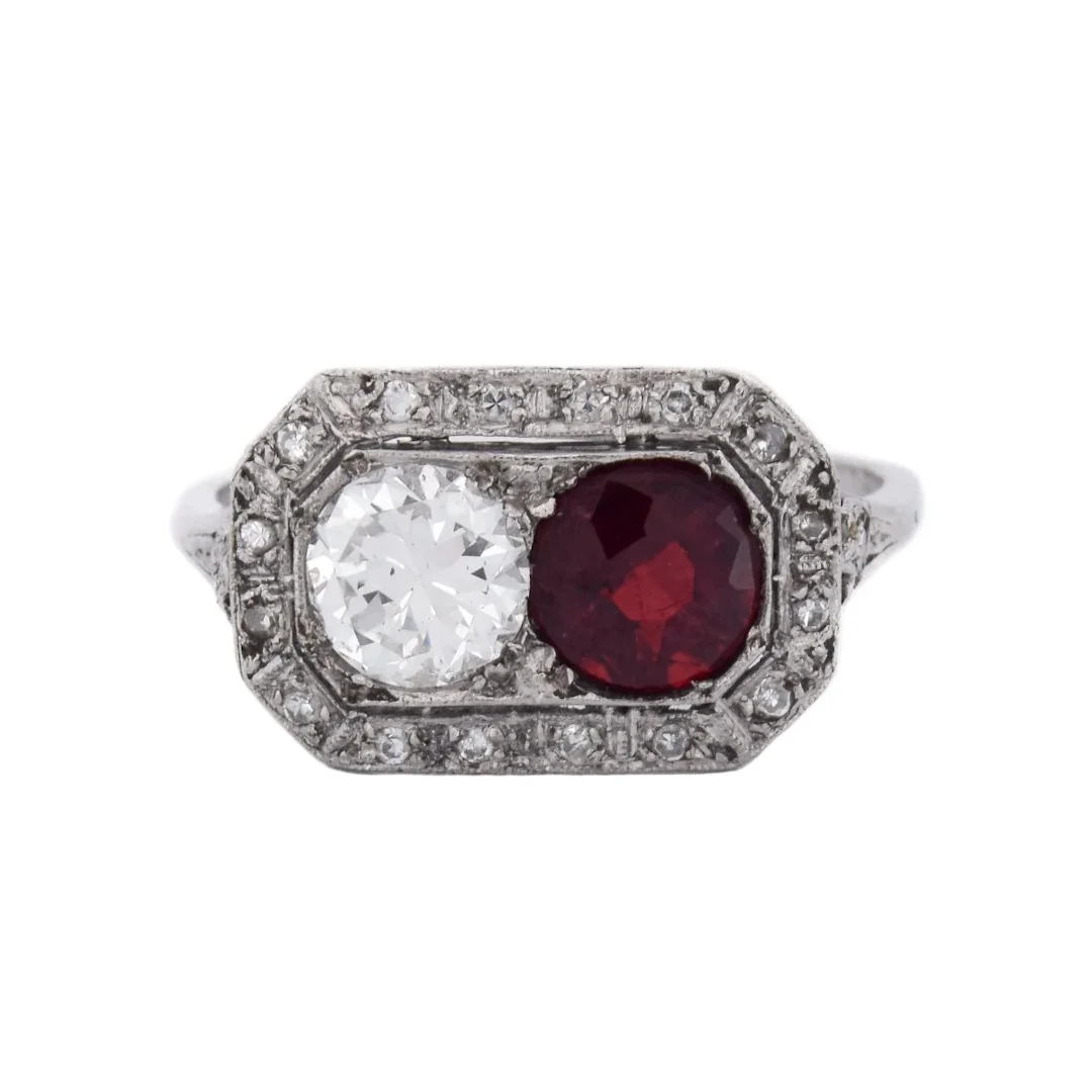 Entourage Ring in platinum, rubies, and diamonds