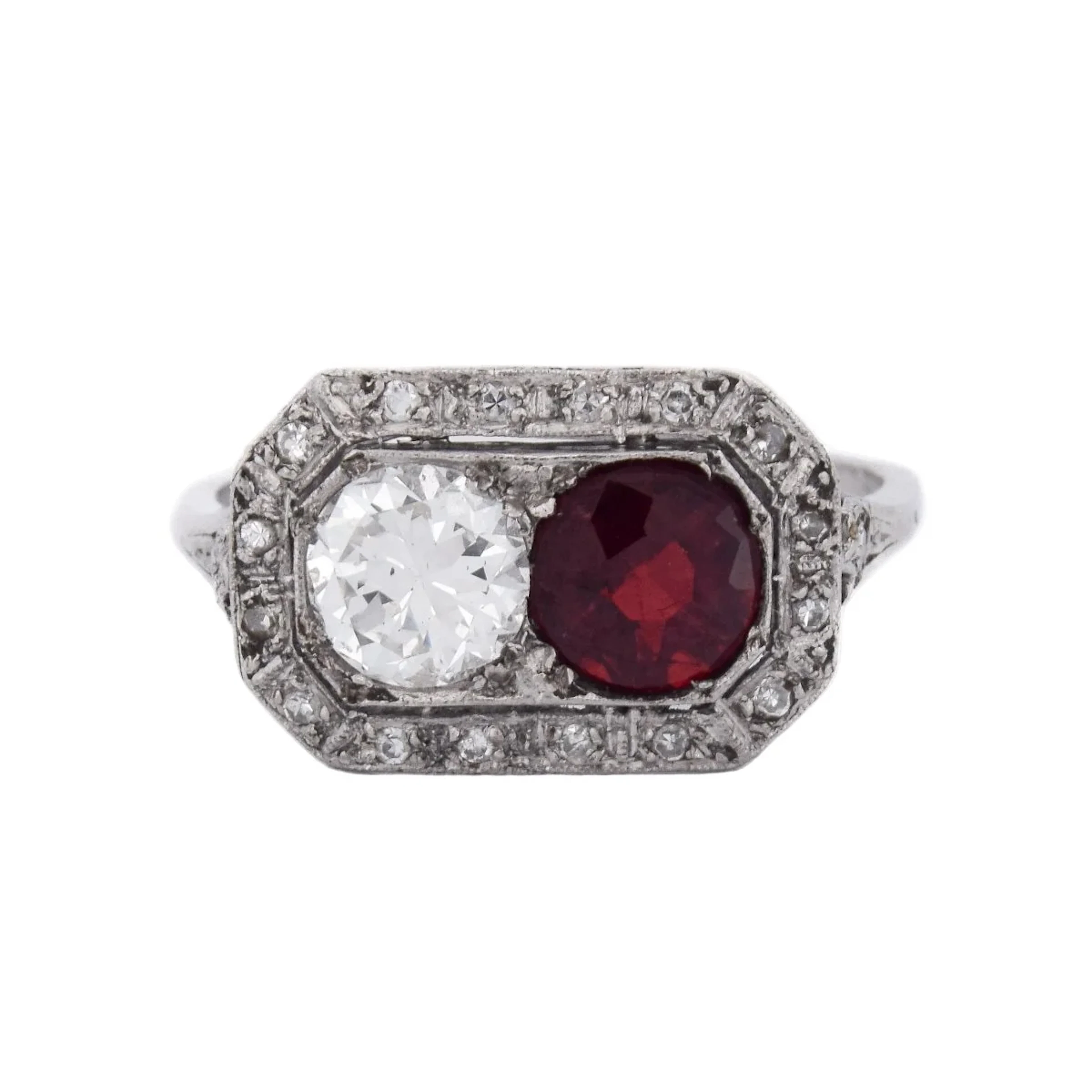 Entourage Ring in platinum, rubies, and diamonds