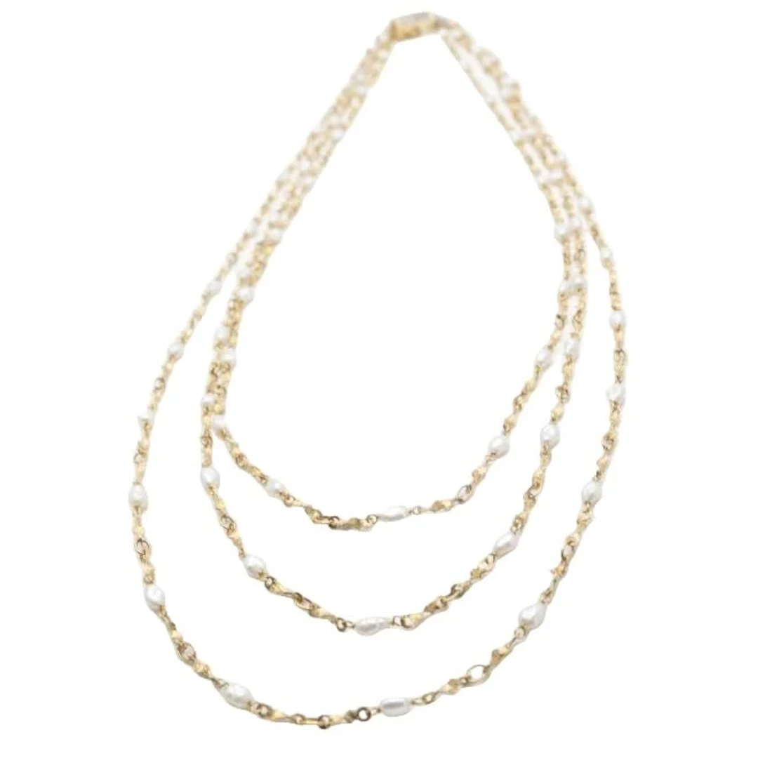 Long necklace in yellow gold, white gold and pearls