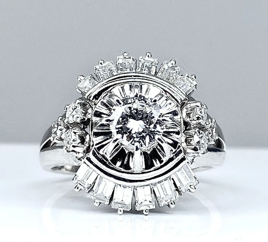 Magnificent platinum ring with baguette diamonds and round diamonds.
